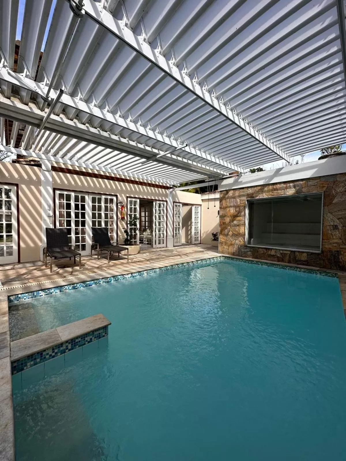 Swimming pool in Pousada Corsario Buzios