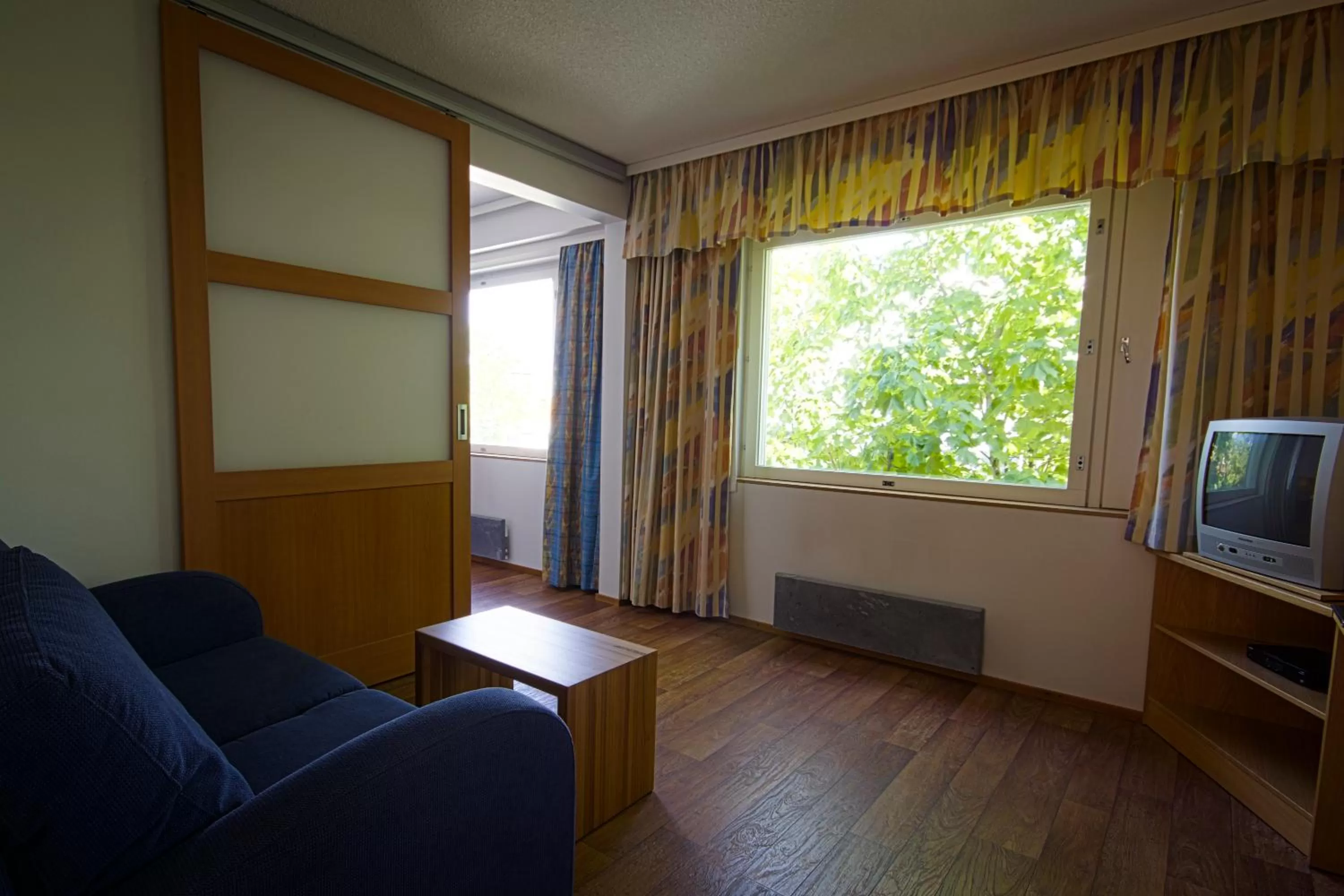 TV and multimedia, Seating Area in Hotelli Pesti