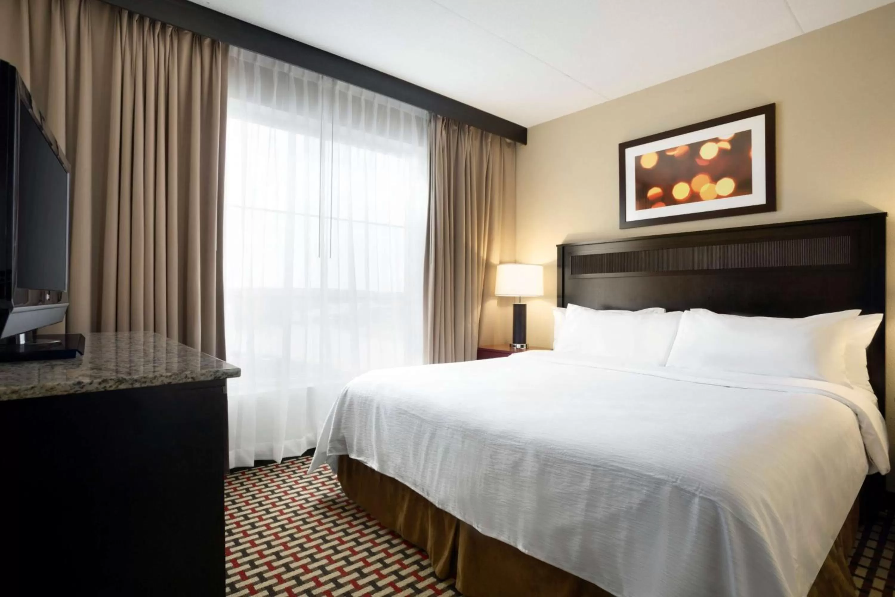 Bed in Embassy Suites by Hilton Jackson North Ridgeland