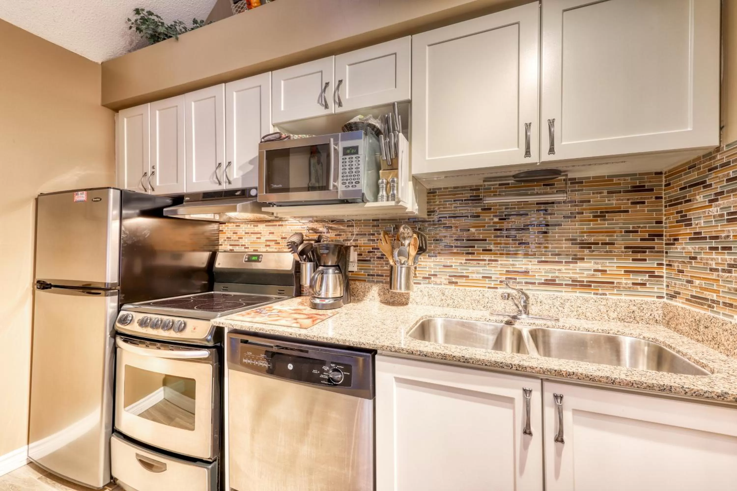 Kitchen/Kitchenette in Condo 214 at North Creek Resort by Vacasa II