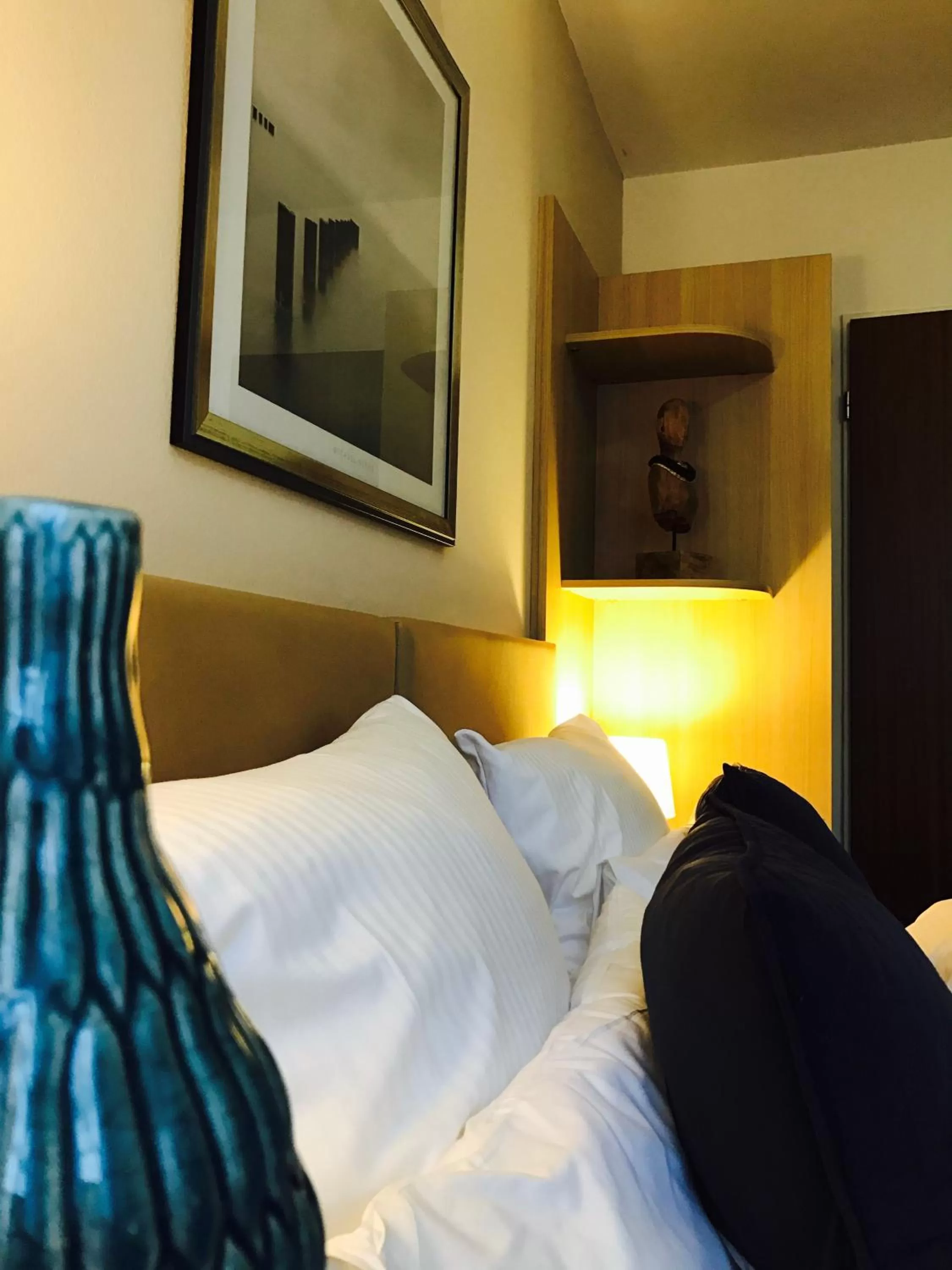 Bed in ONNO Boutique Hotel & Apartments