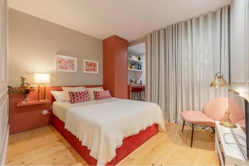 Bed in As Vizinhas Boutique Apartments