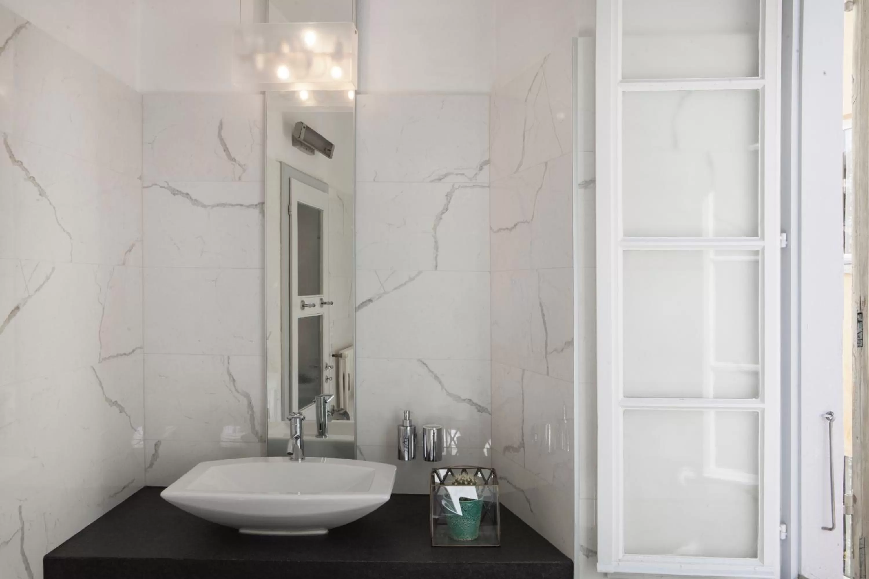 Bathroom in Caffè dell'Arte Boutique Rooms Locarno