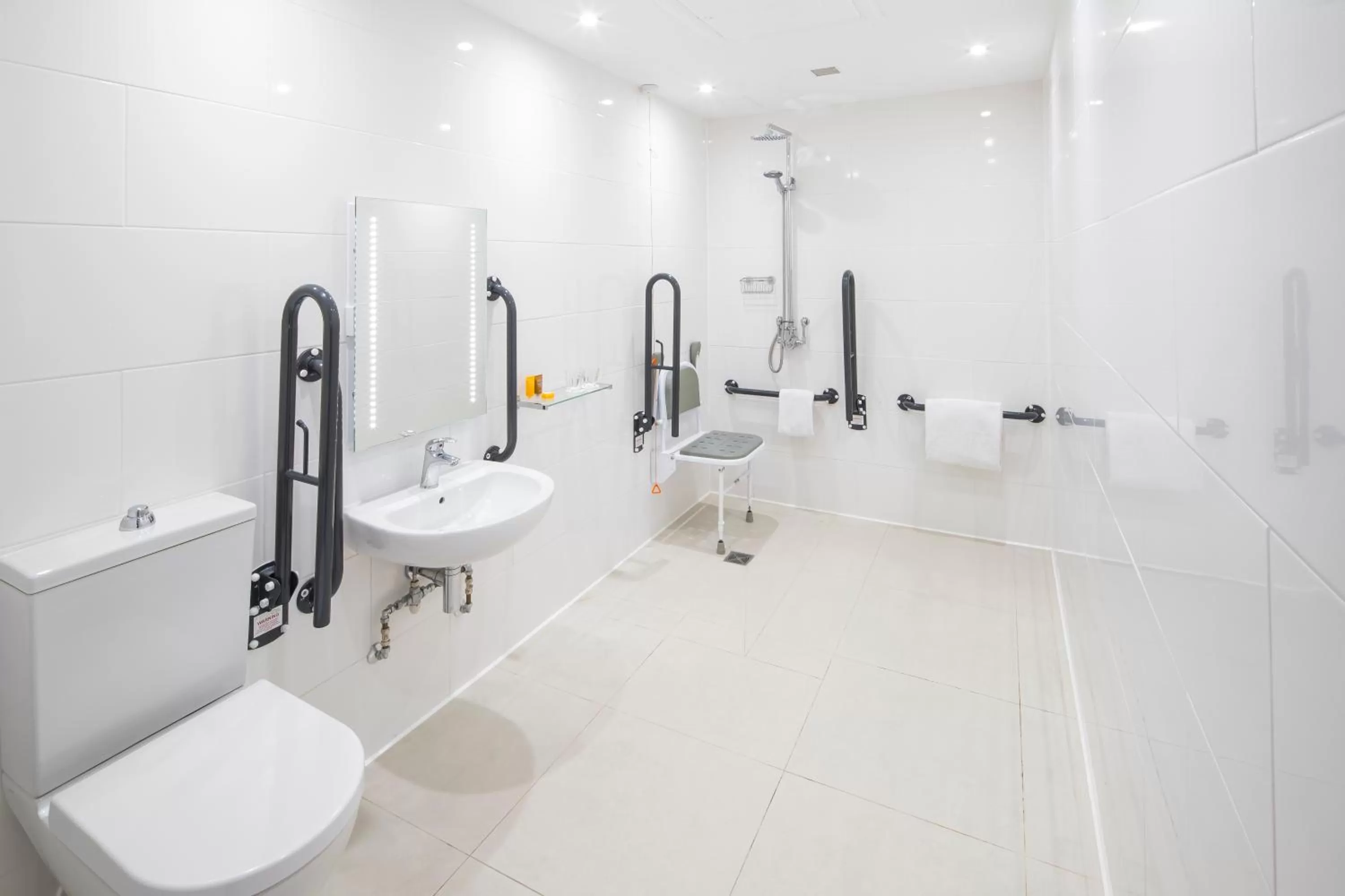 Toilet in Holiday Inn Peterborough West by IHG