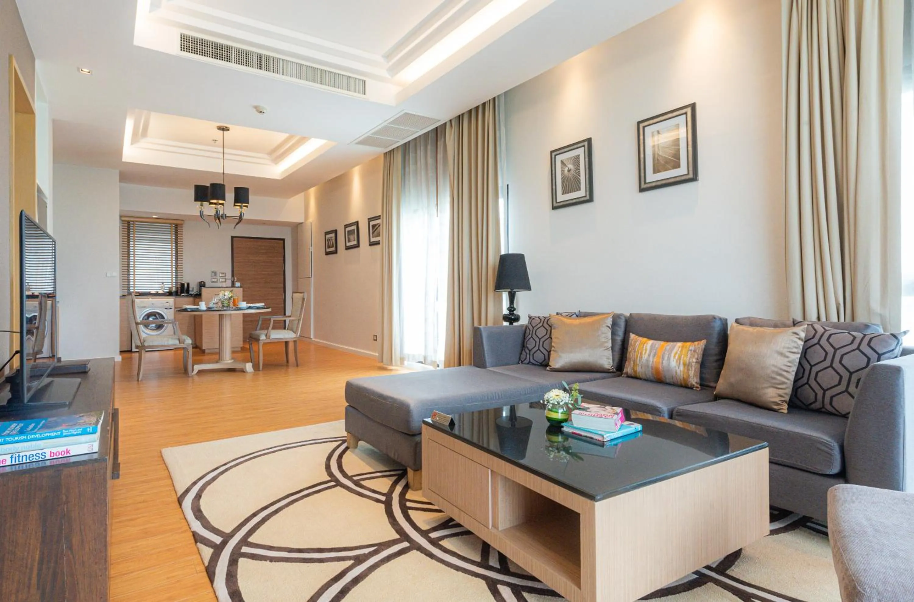 Living room in Summit Windmill Golf Suite Hotel at Suvarnabhumi