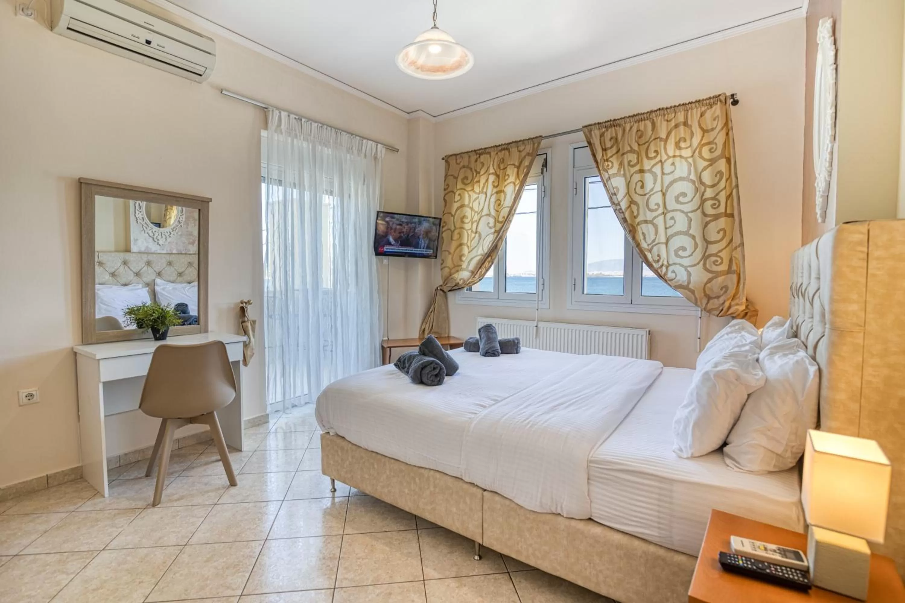 Bed in Votsalakia Hotel & Luxury Apartments