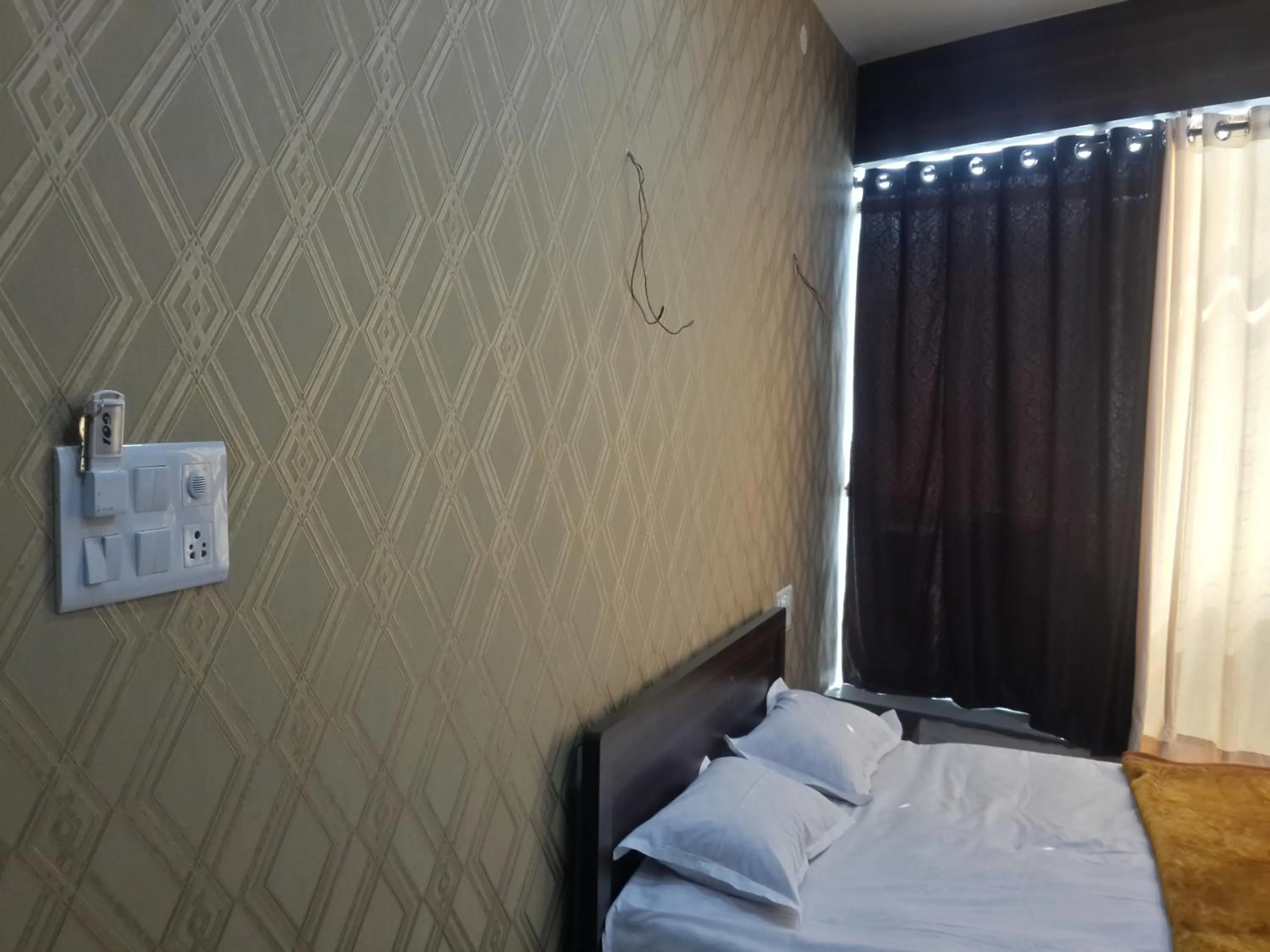 City view, Bed in Hotel Holiday Era Opposite Railway Station