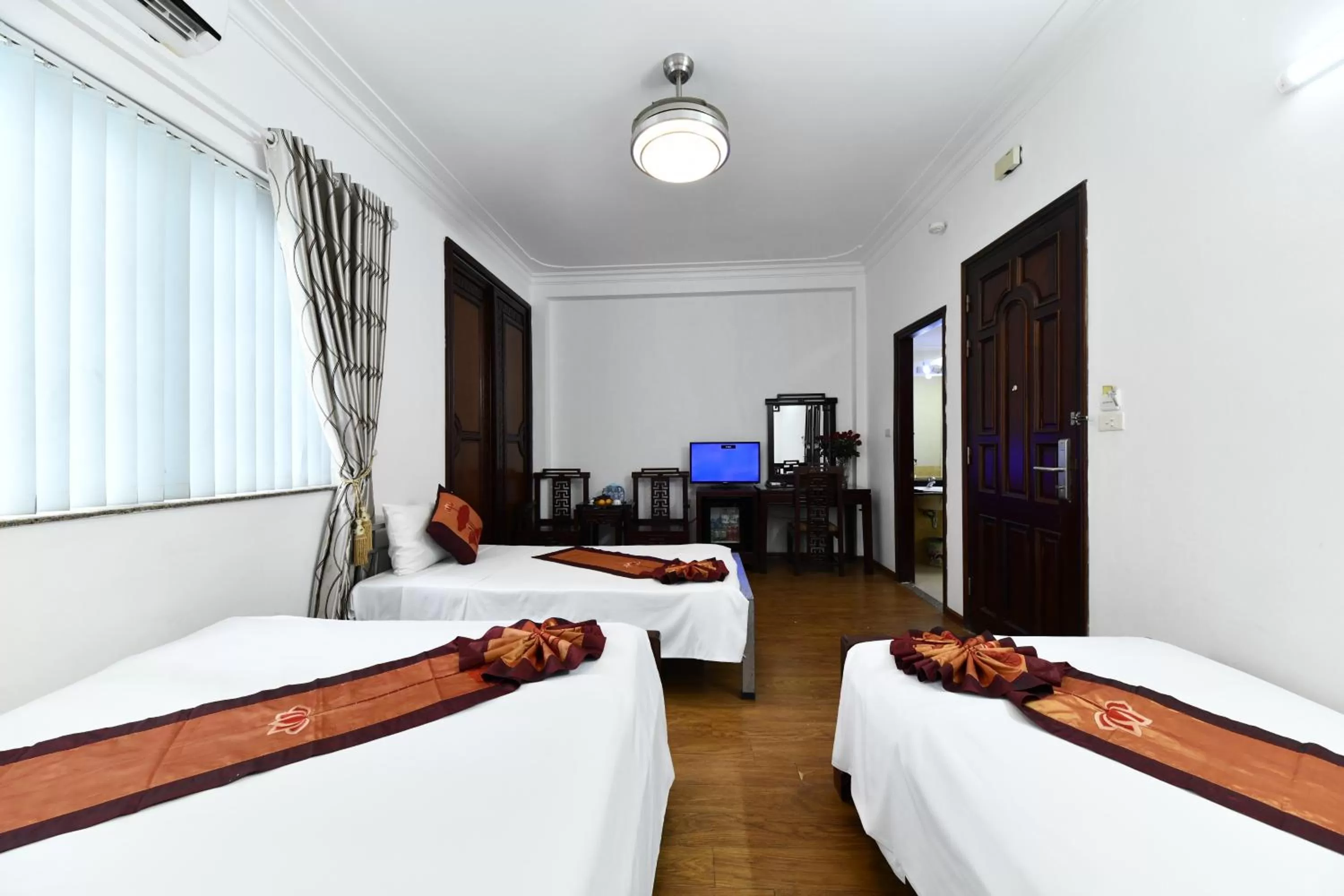 Bed in Phoenix Legend Hotel Hanoi