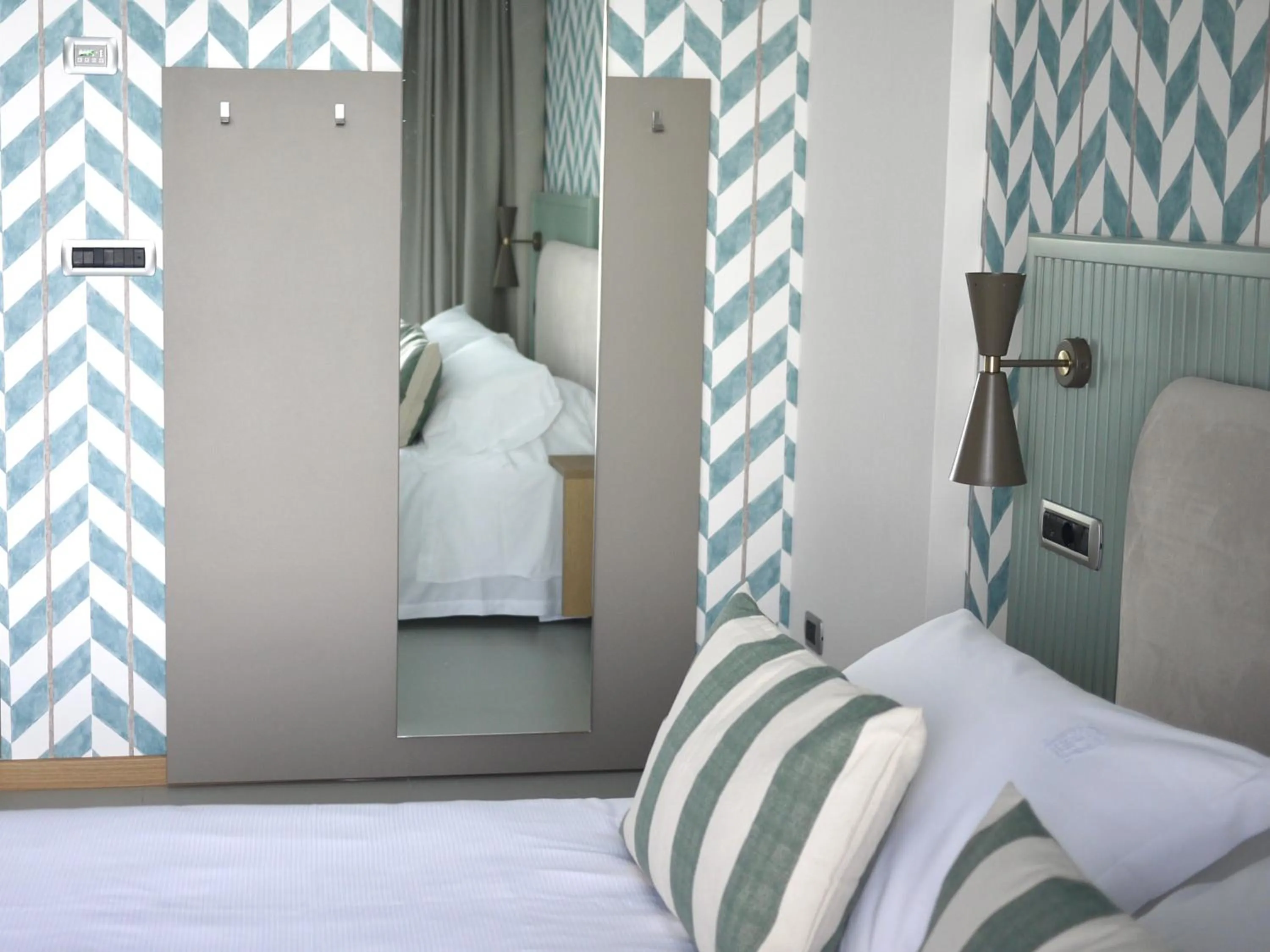 Bed in Reginna Palace Hotel