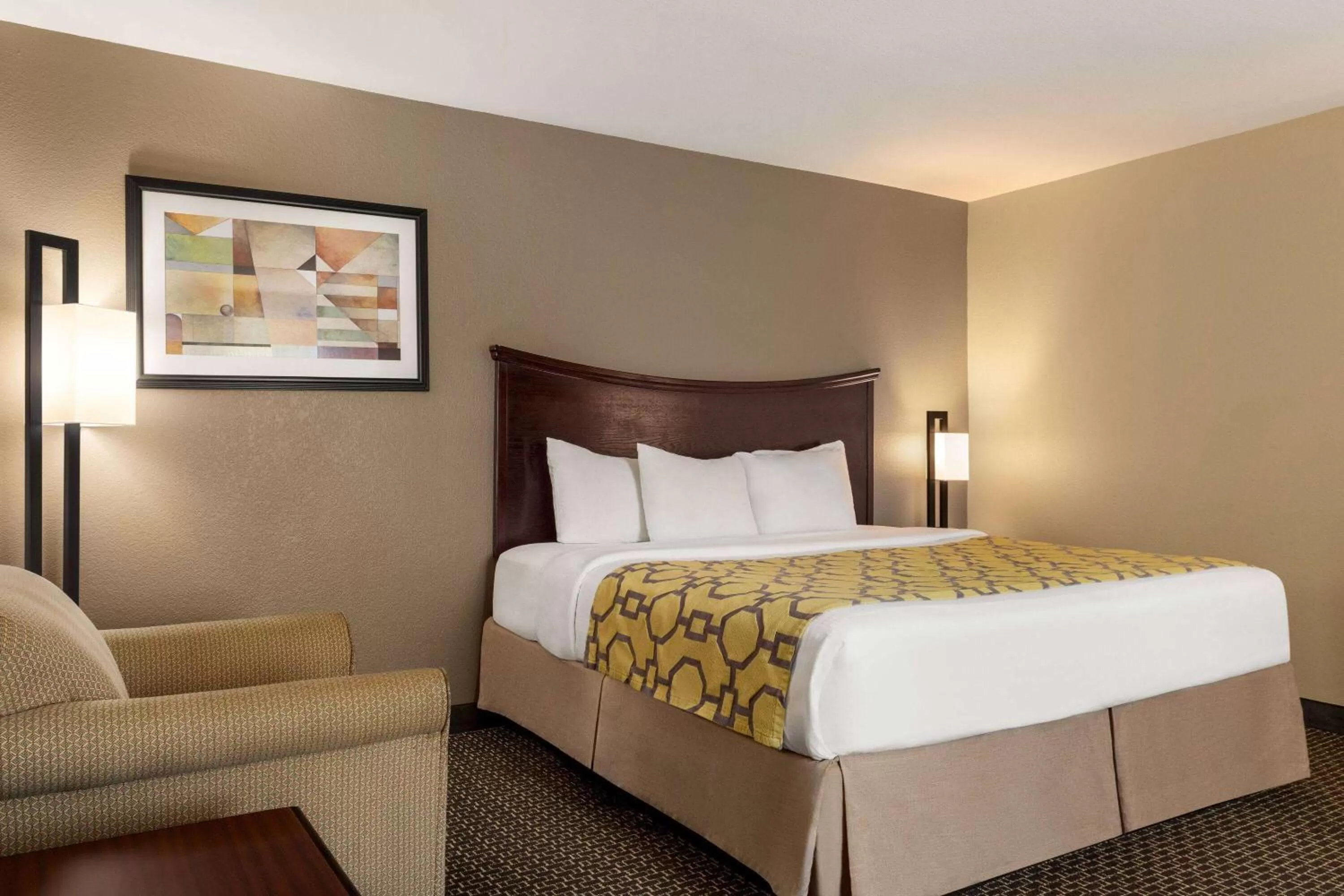Bed in Baymont by Wyndham Wichita Falls