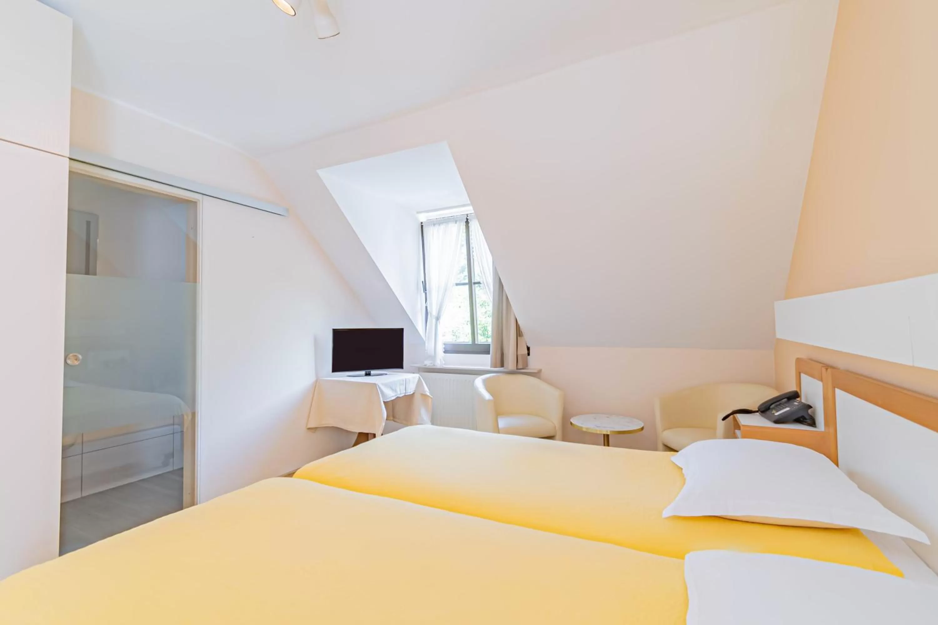 Bed in Hotel Le Postillon