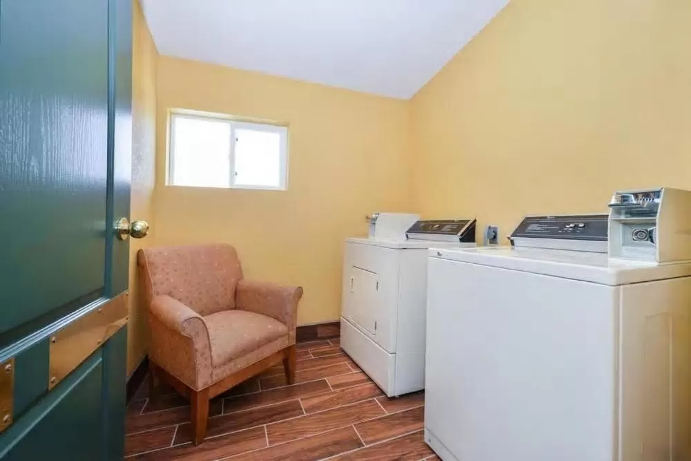 washing machine in Super 8 by Wyndham Lake of the Ozarks