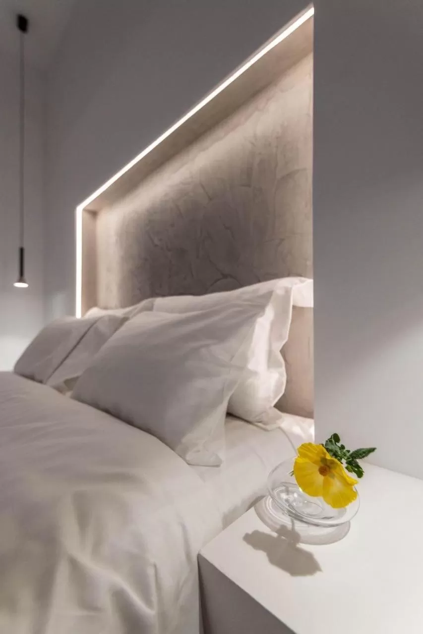 Bed in Sunset Paraportiani Rooms