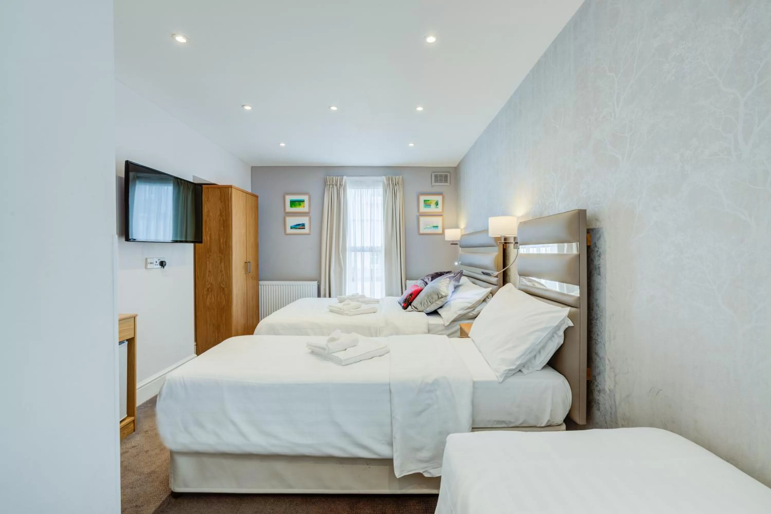 Bed in Admiral Hotel at Park Avenue