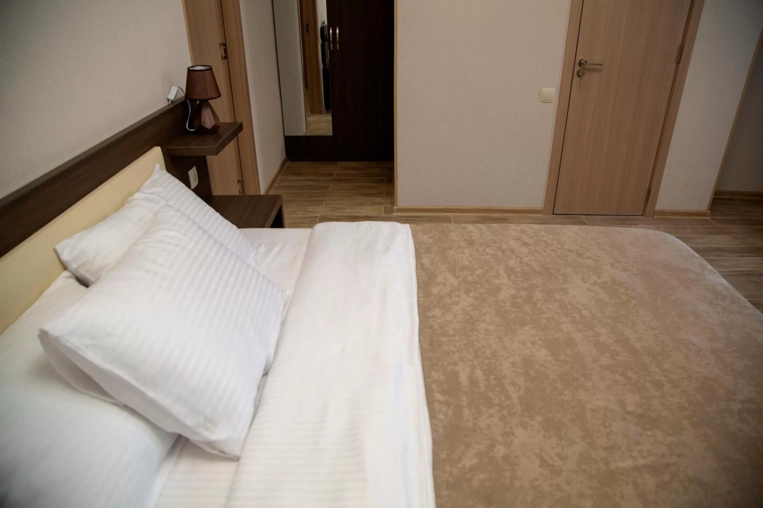 Bed in Family Hotel Triston