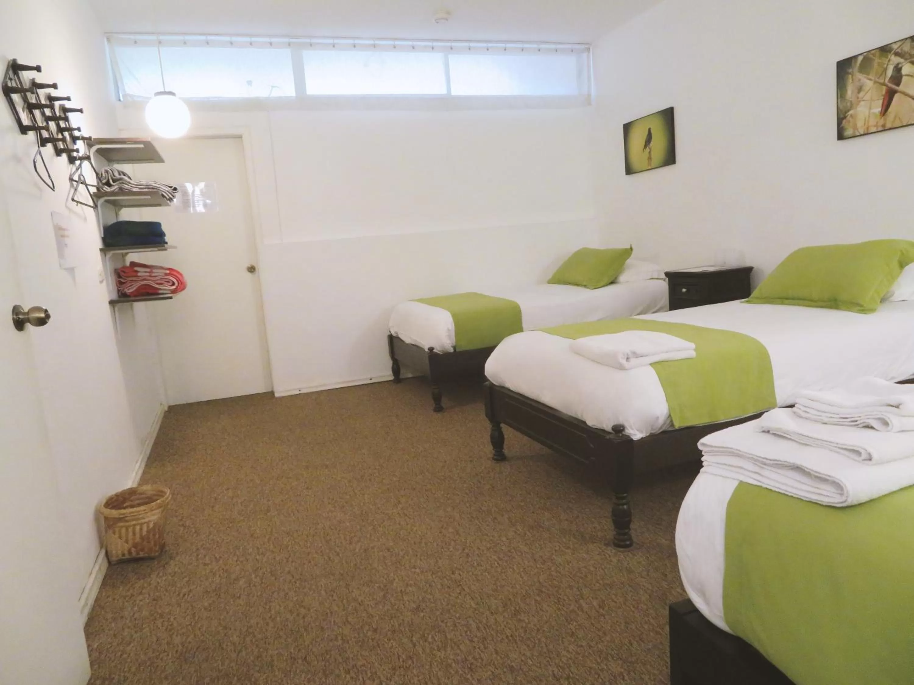 Bed in Bird Garden Guest House