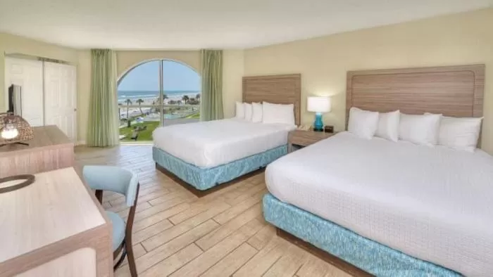 Bedroom, Bed in El Caribe Resort and Conference Center