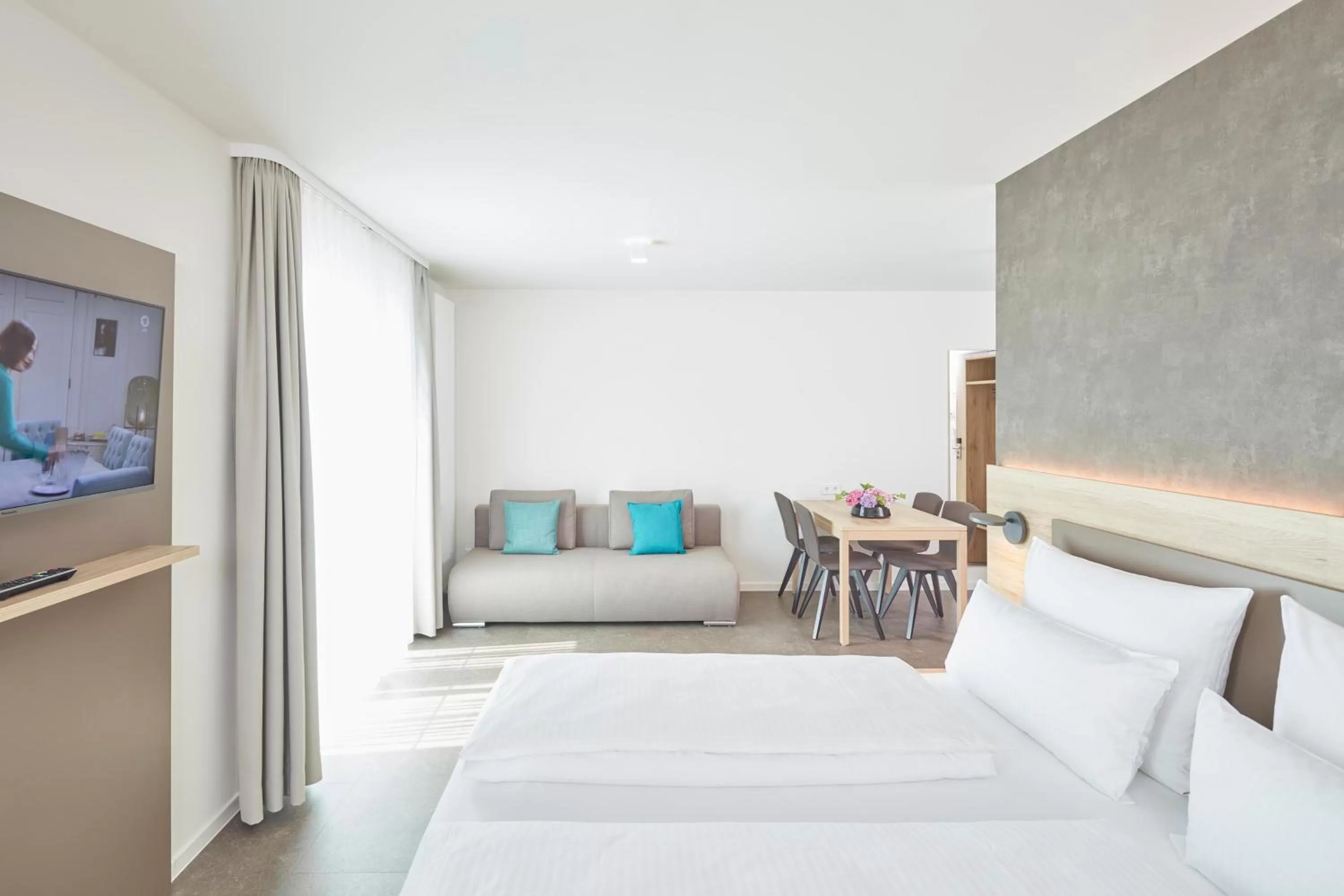 Bed in Gästehaus Bauer - Schlafen auf dem Weingut