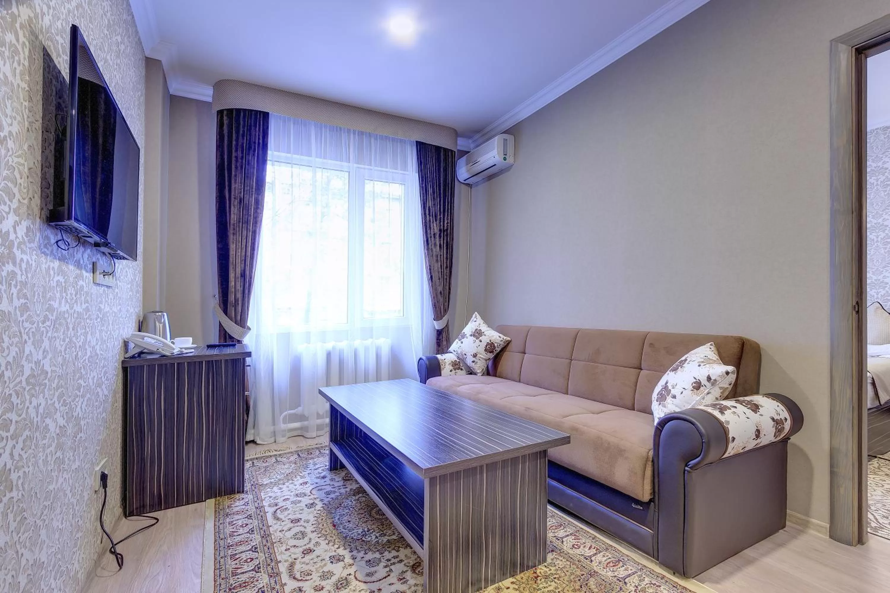 Living room in Resident Hotel Almaty