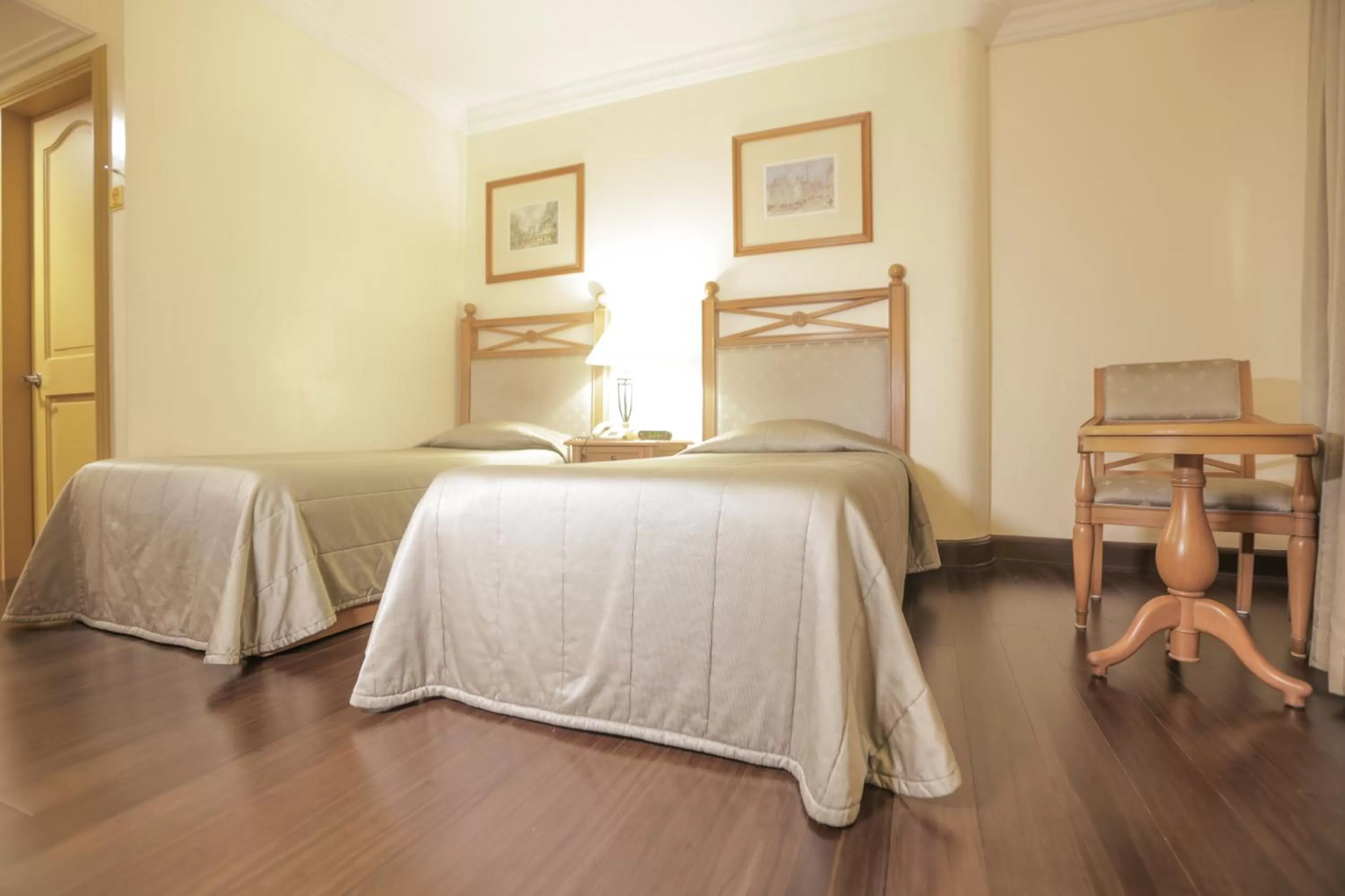 Bed in The Grand Dame Hotel