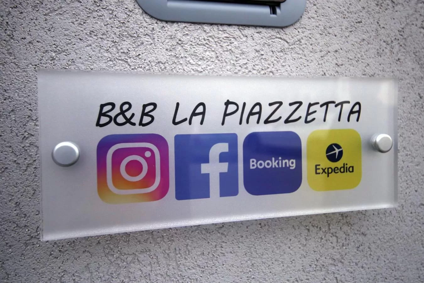 Property logo or sign in La piazzetta