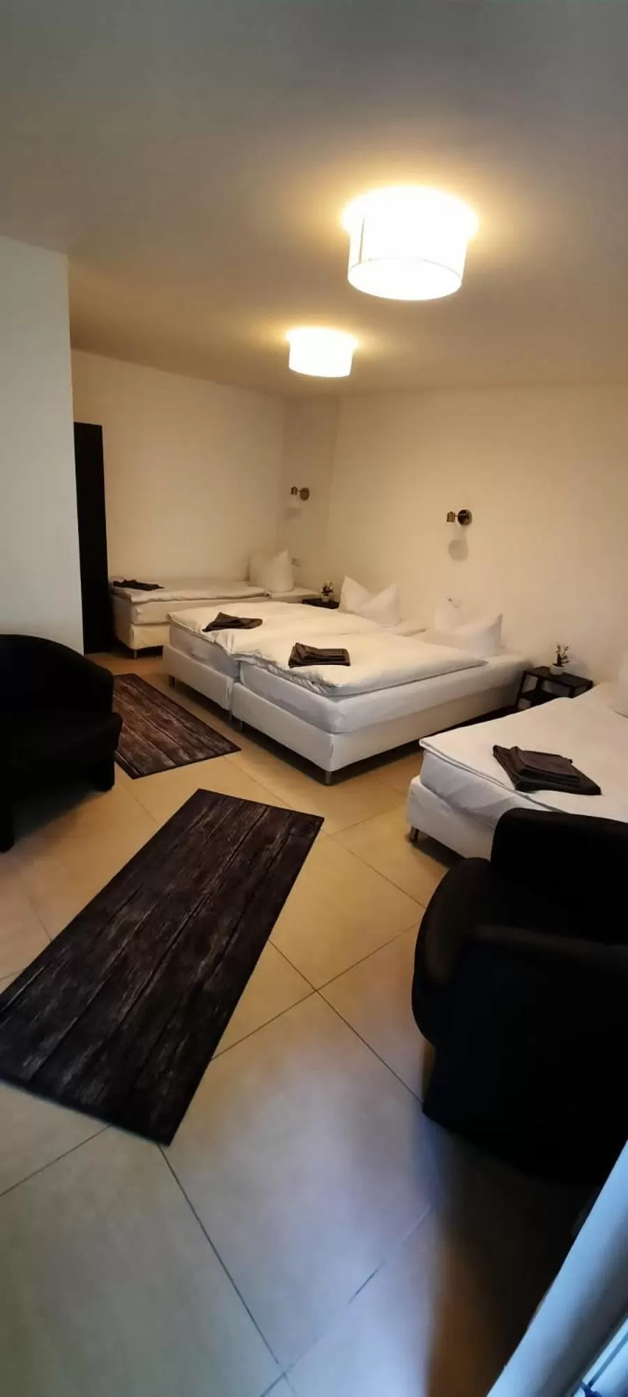 Bed in Nürnberger Trichter Family-Business Hotel Garni