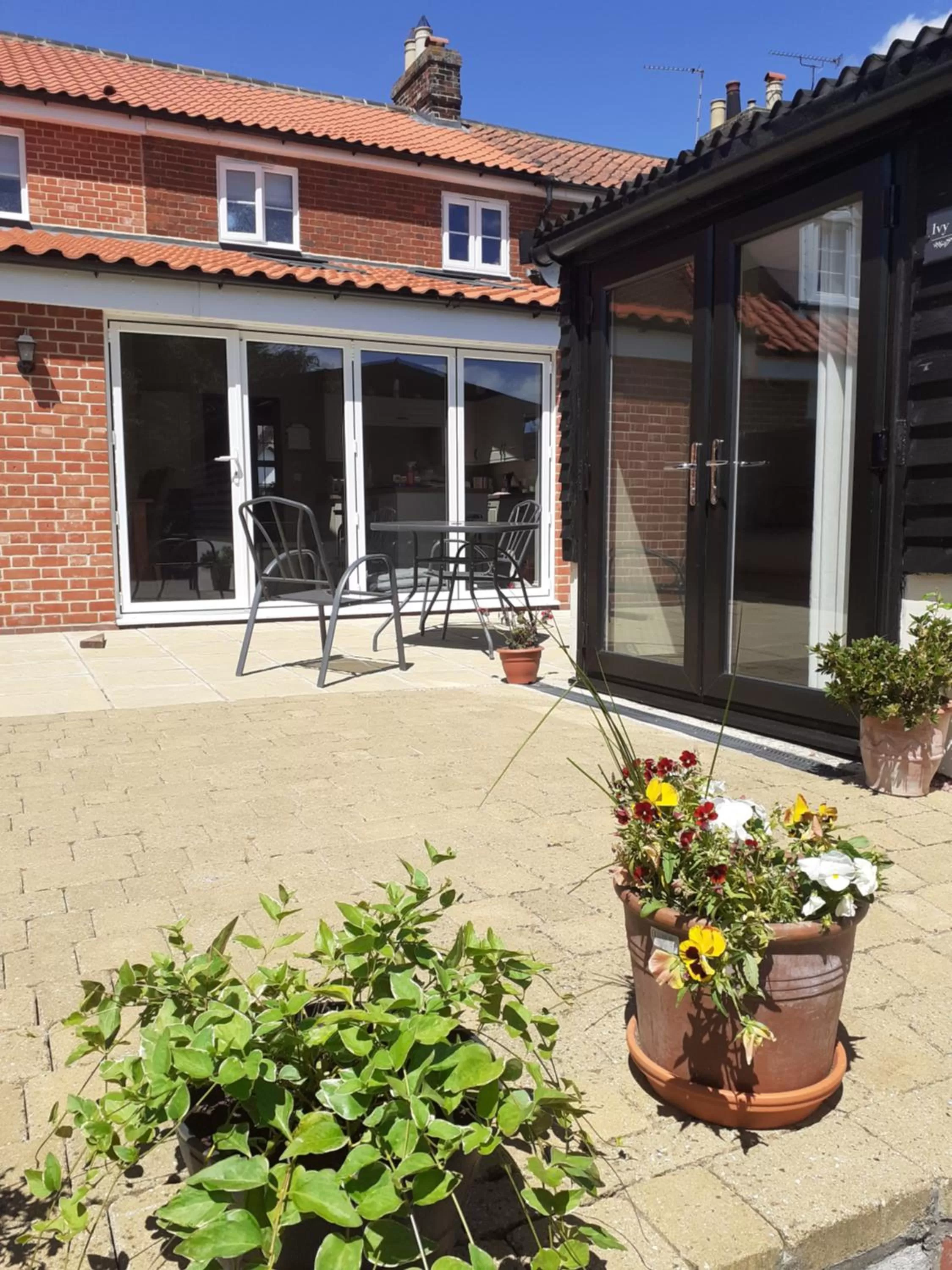 Property building in 1 ivy cottages the street norton subcourse NR146RS