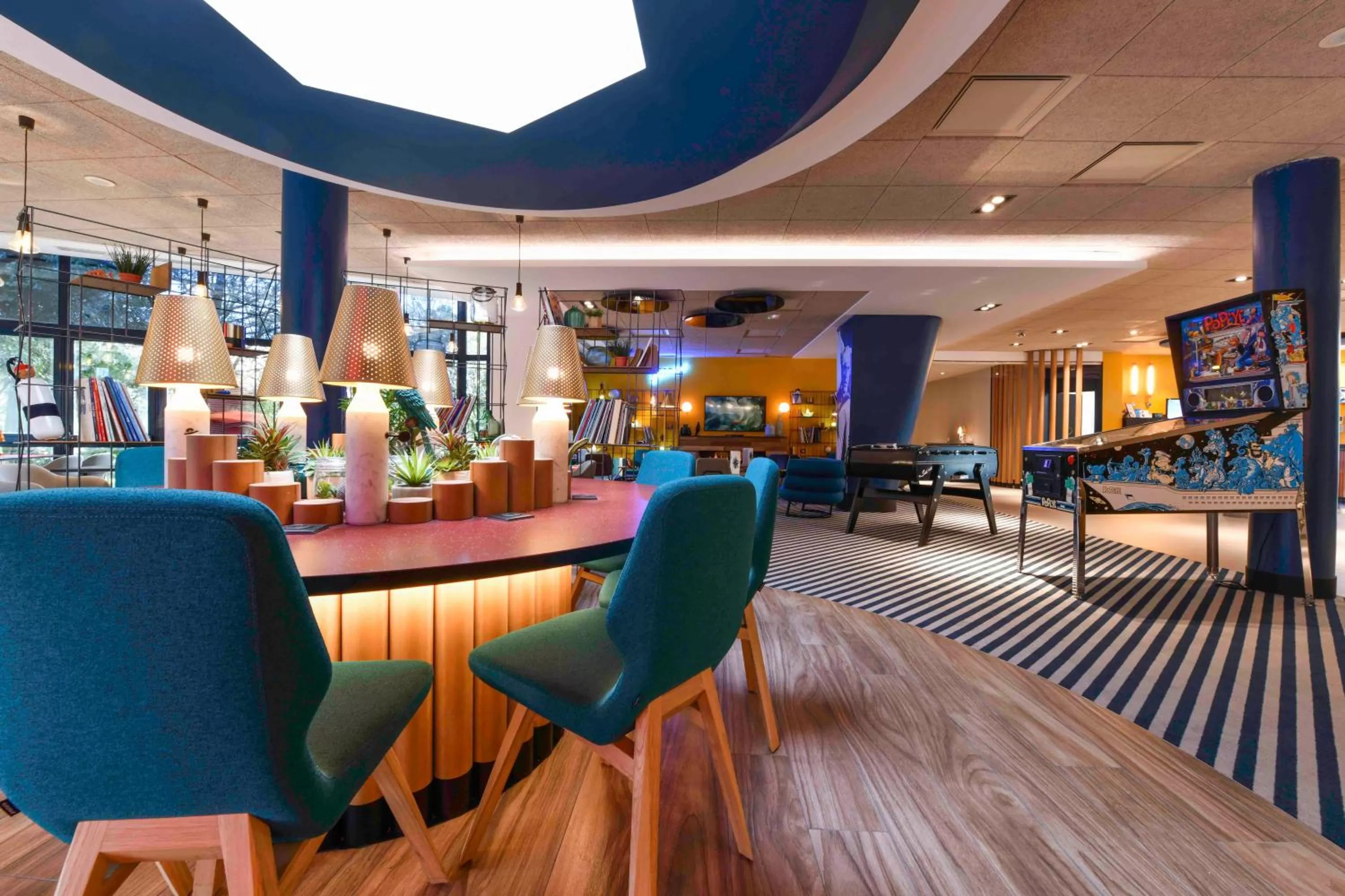 Communal lounge/ TV room in Novotel La Rochelle Centre