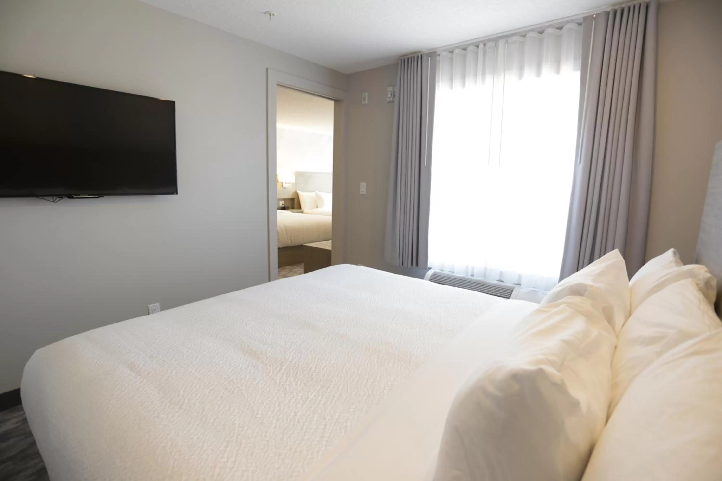 Bed in Days Inn by Wyndham Calgary North Balzac