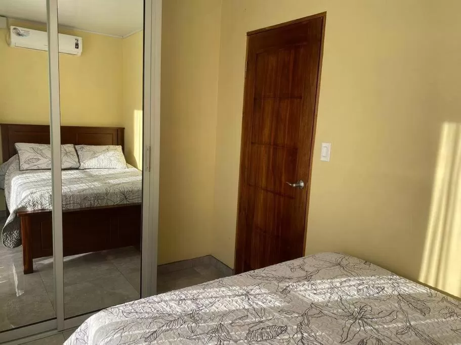 Photo of the whole room, Bed in Airport SJO Residence - Edward & Familia Inn