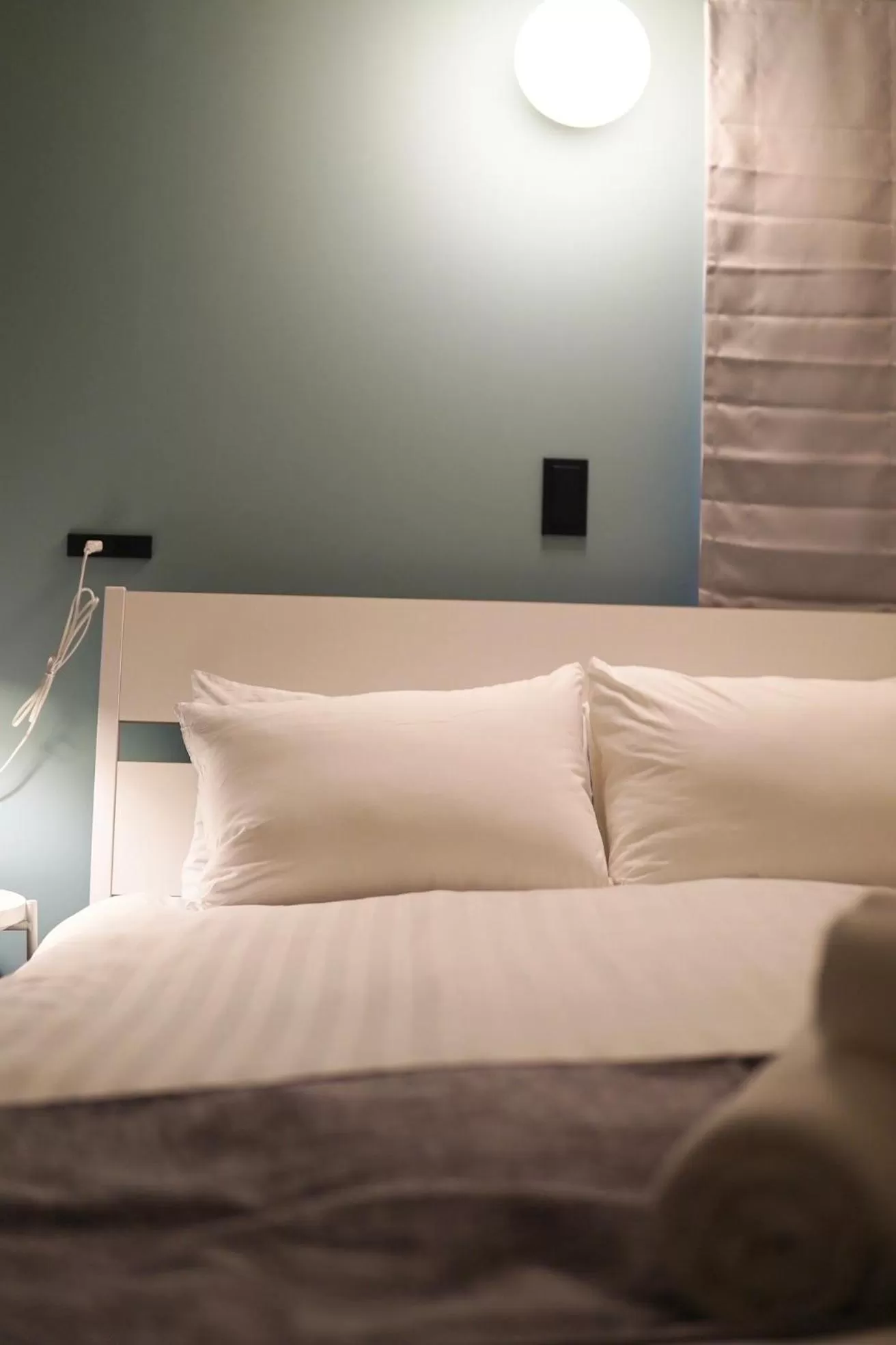 Bed in TAKETO STAY PREMIERE SAPPORO Eki