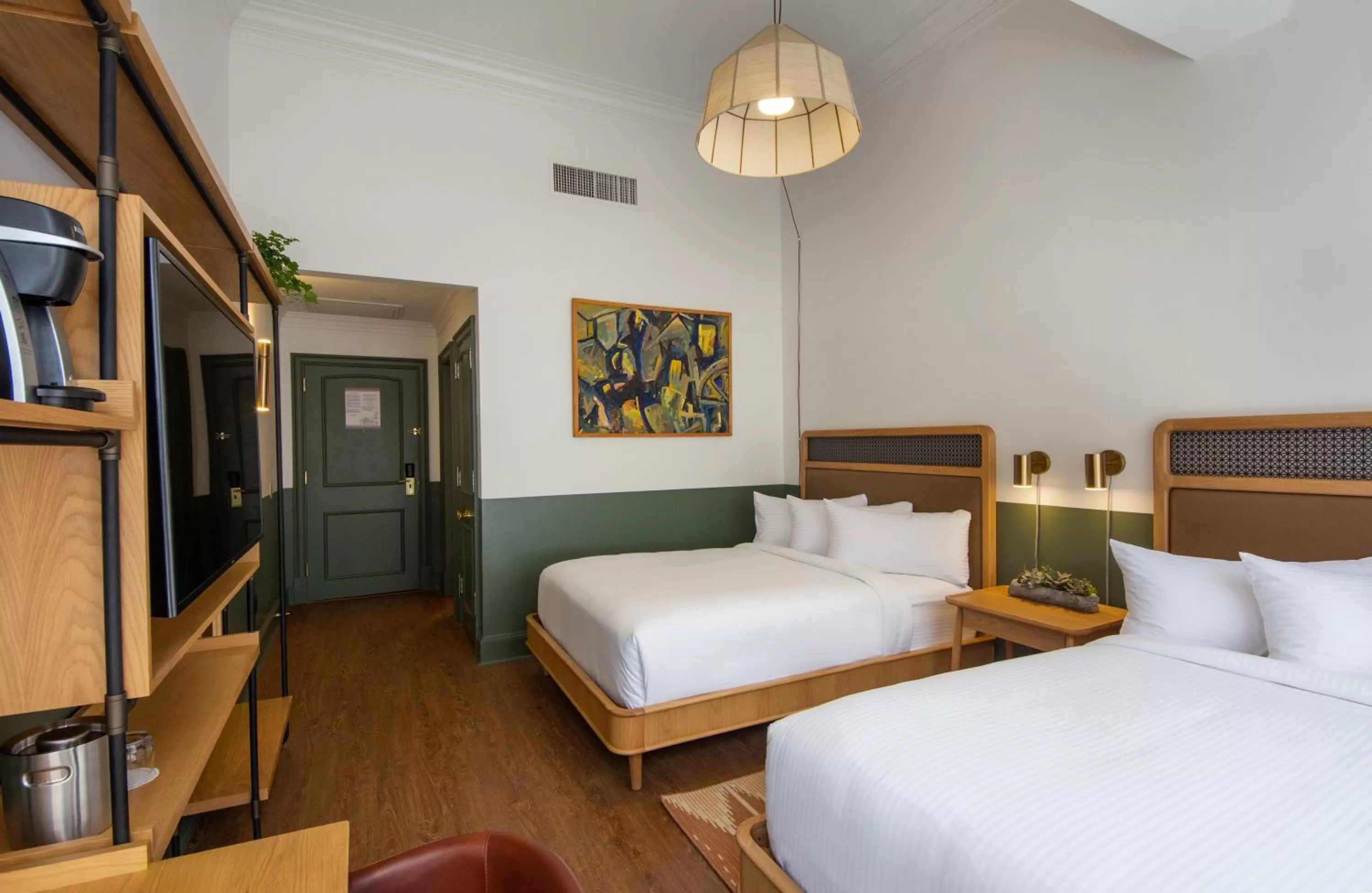 Bed in Hotel Theo New Orleans, Tapestry Collection by Hilton