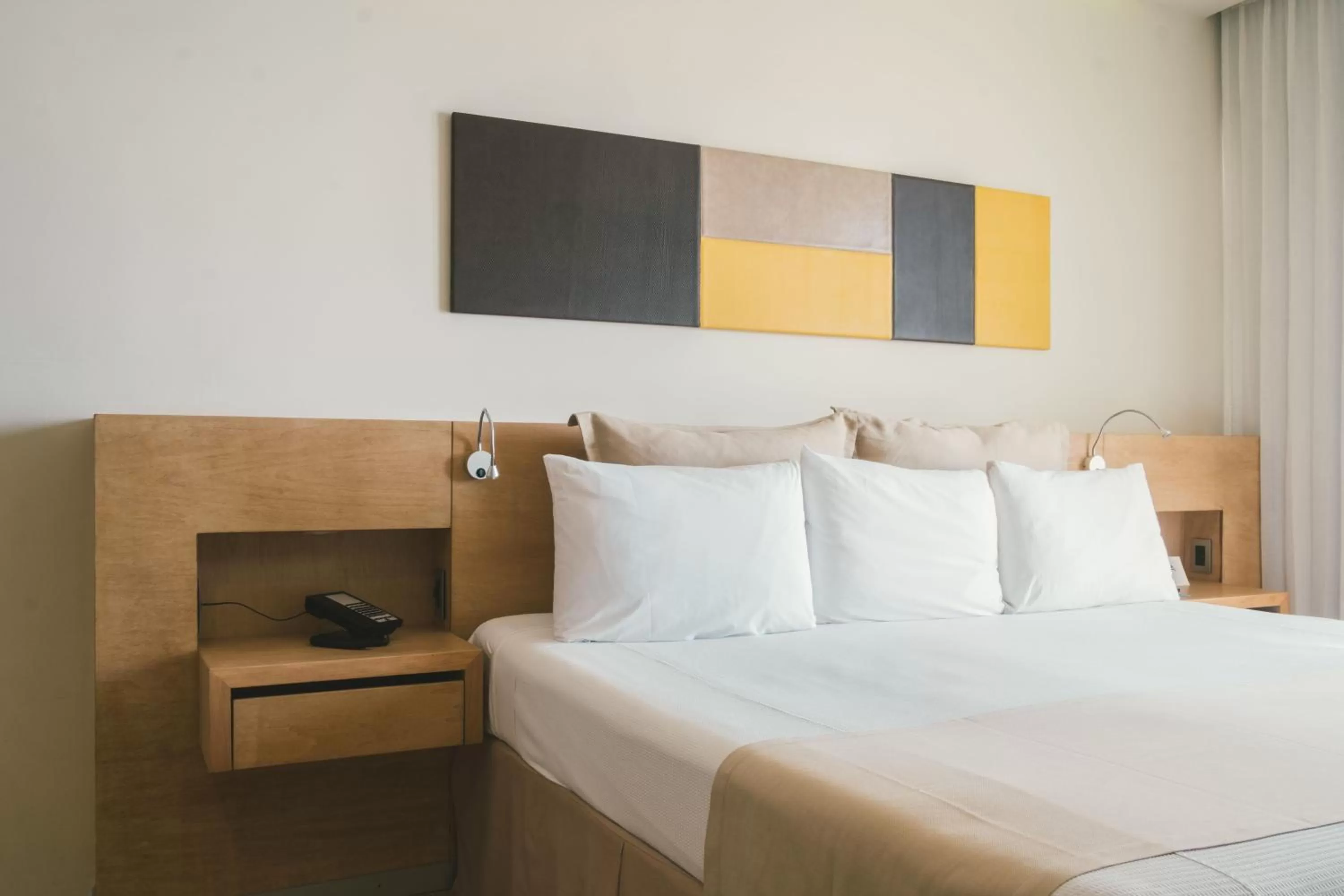 Bed in Hotel NYX Cancun