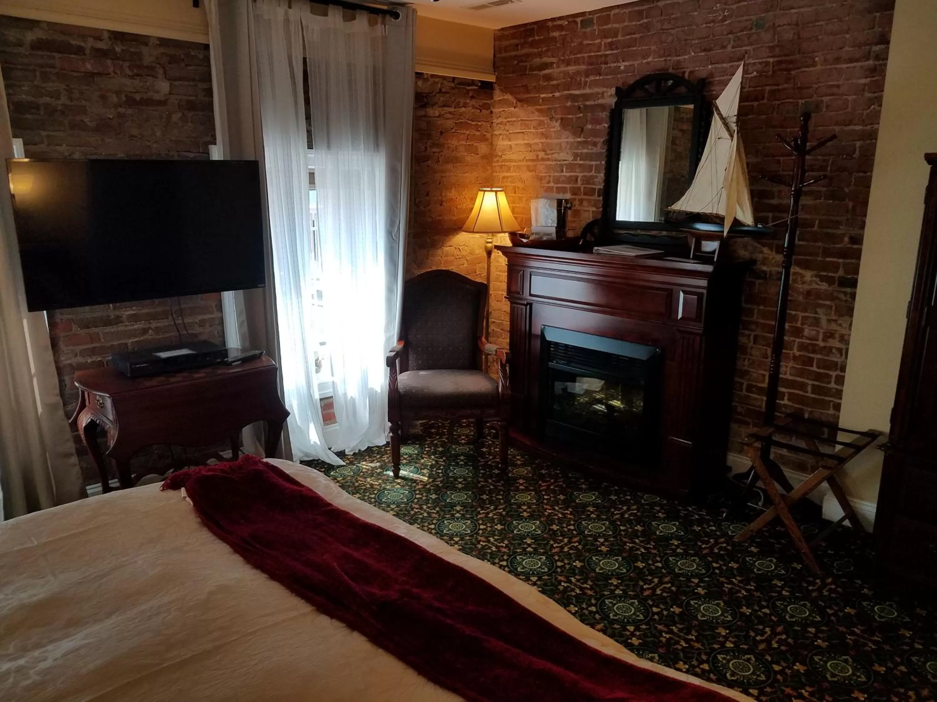 Decorative detail, TV/Entertainment Center in Old Brick Inn