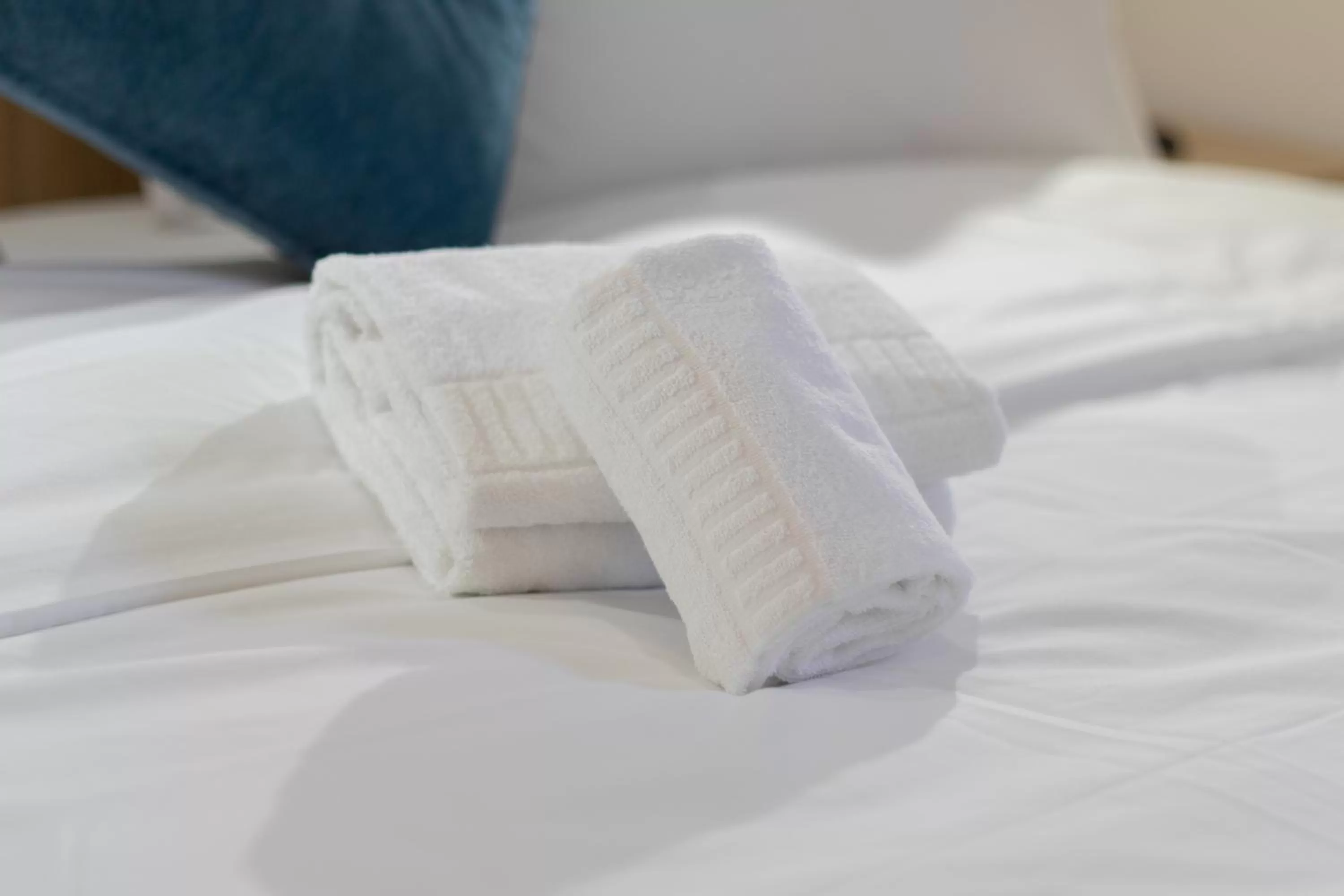 towels, Bed in Karam City Hotel