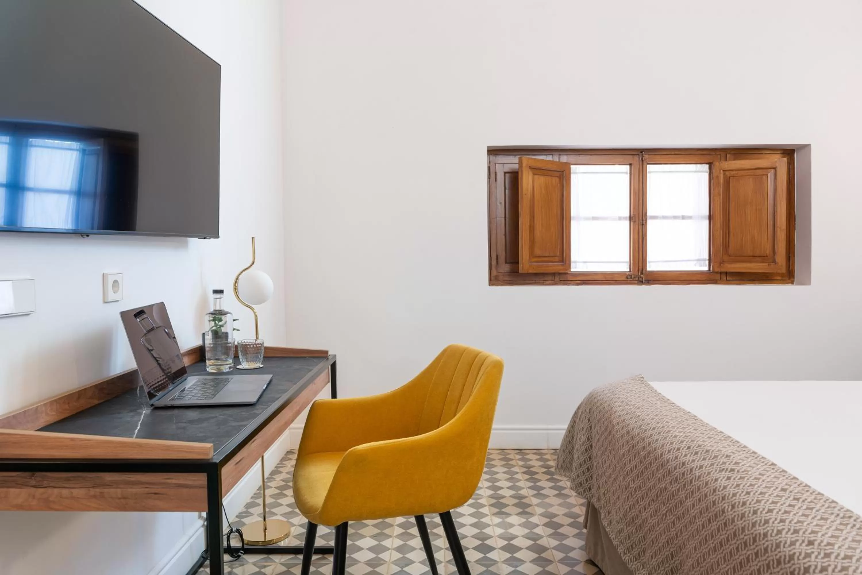 Seating area, Bed in Hotel Can Quetglas