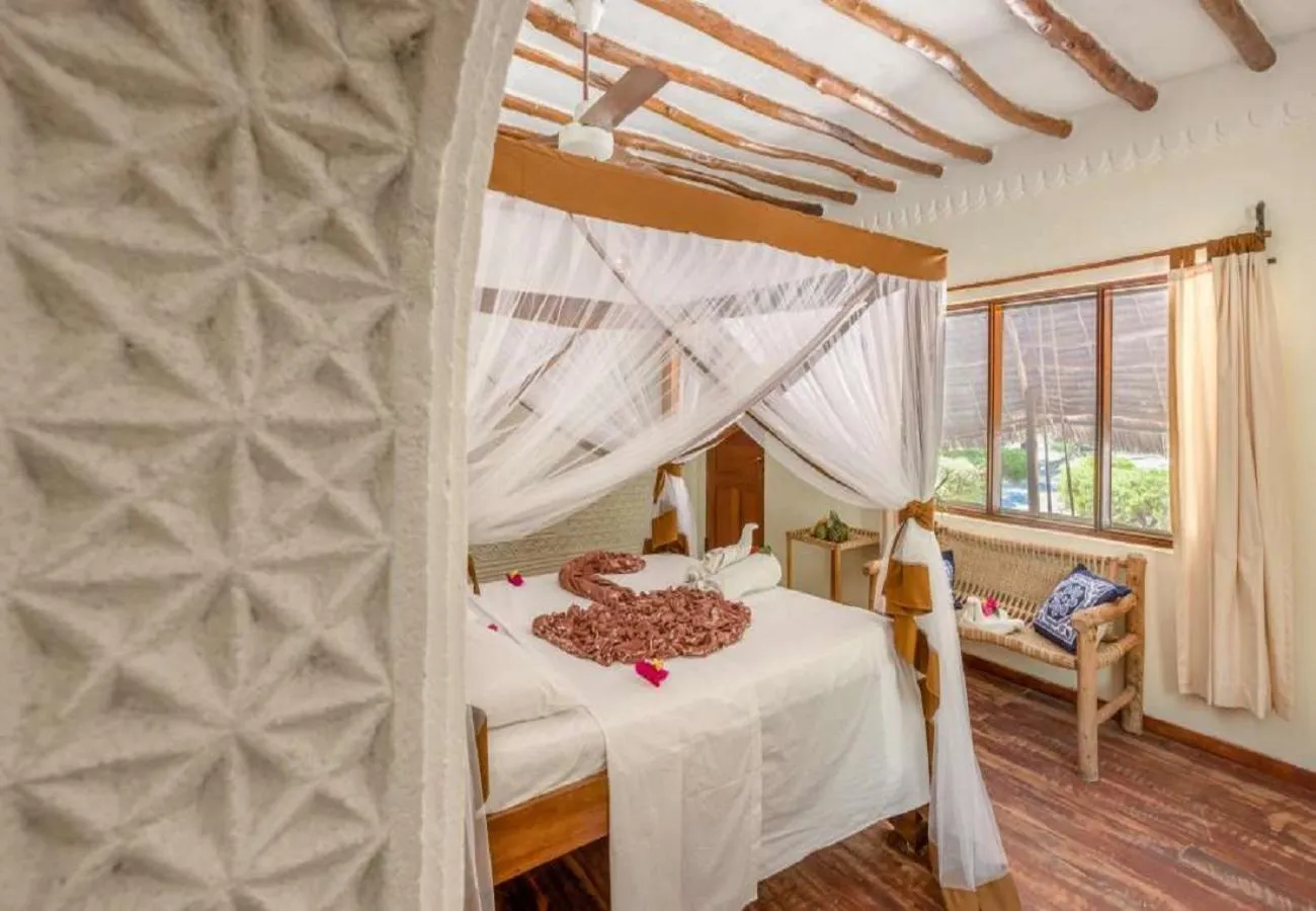 Bedroom, Bed in Hakuna Majiwe Beach Lodge