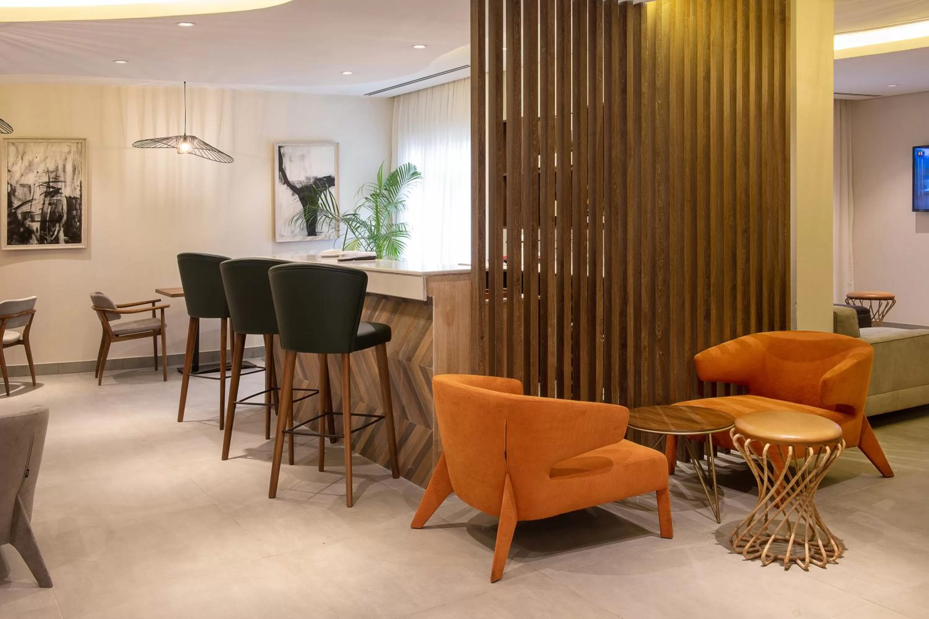 Lounge or bar in The White Orchid Hotel