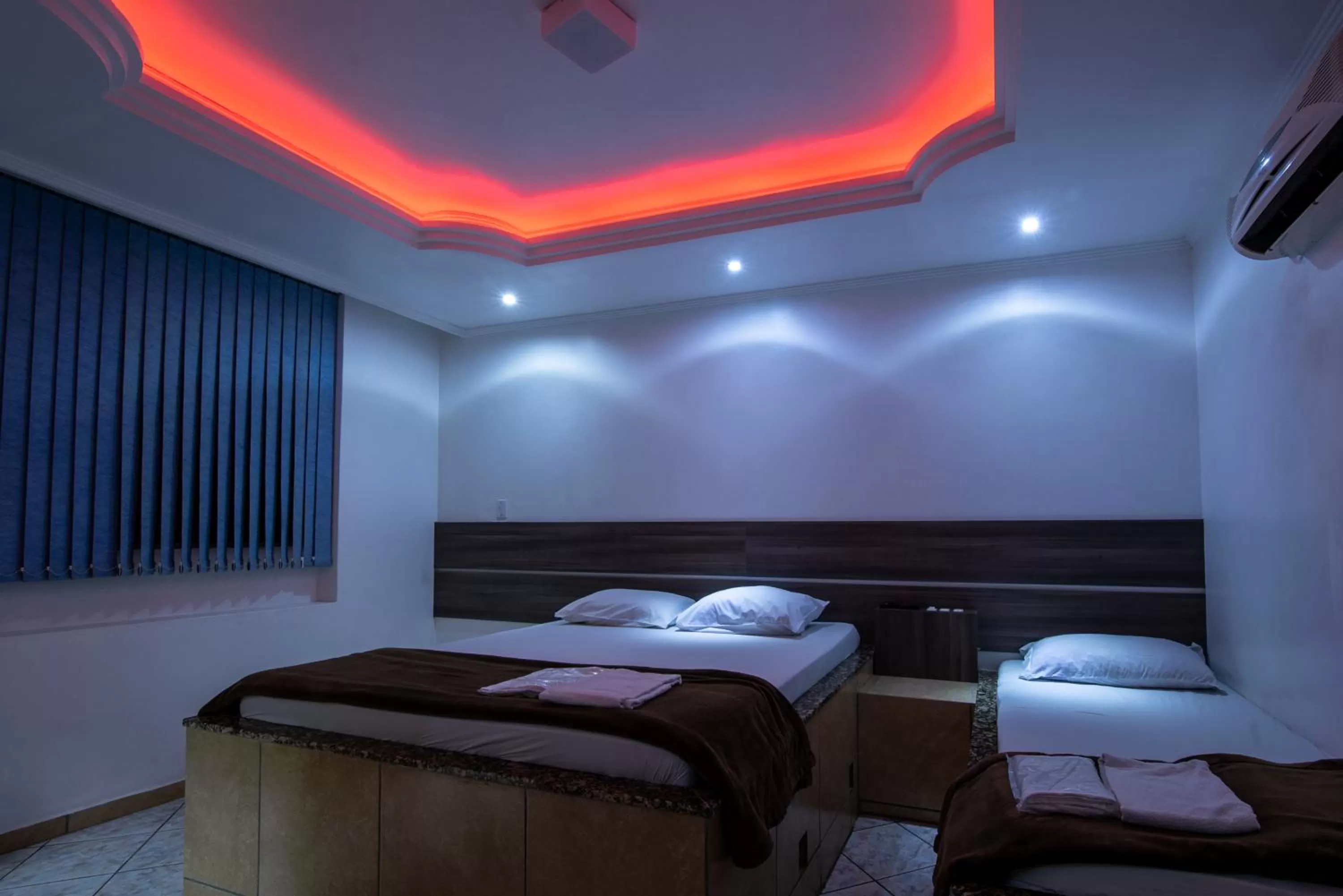 Bedroom in Classic Hotel e Motel