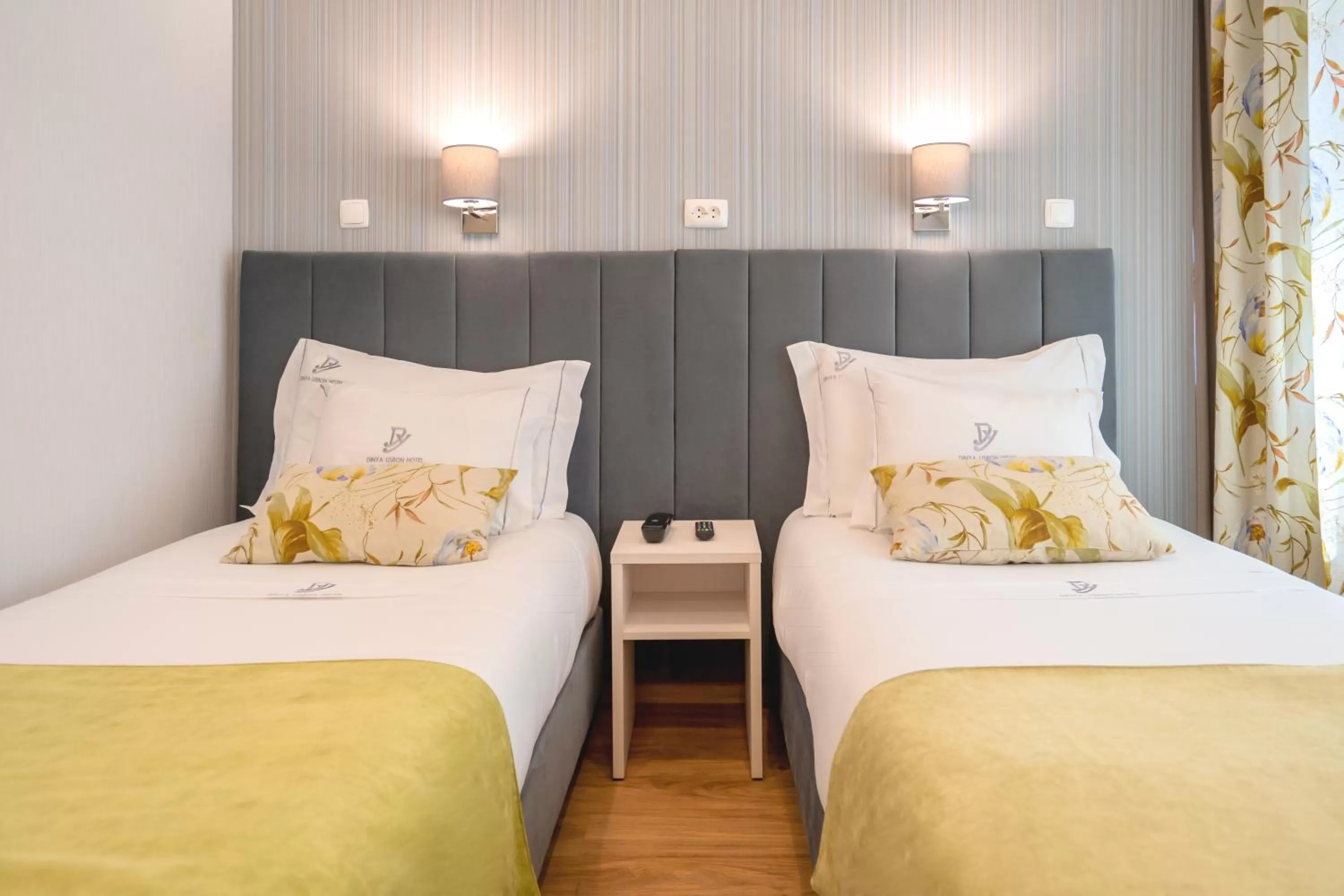 Bed in Dinya Lisbon Hotel