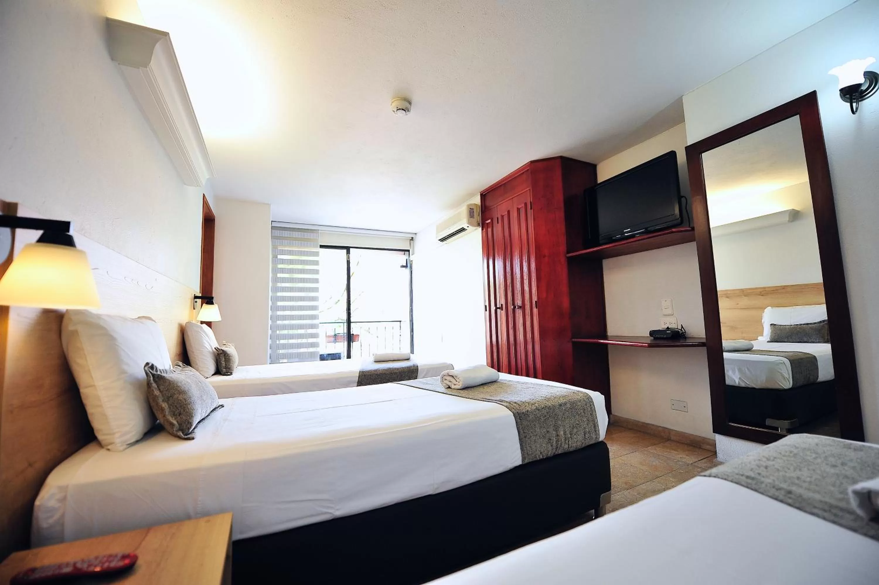 Photo of the whole room, Bed in Hotel Cabo de la Vela Medellin