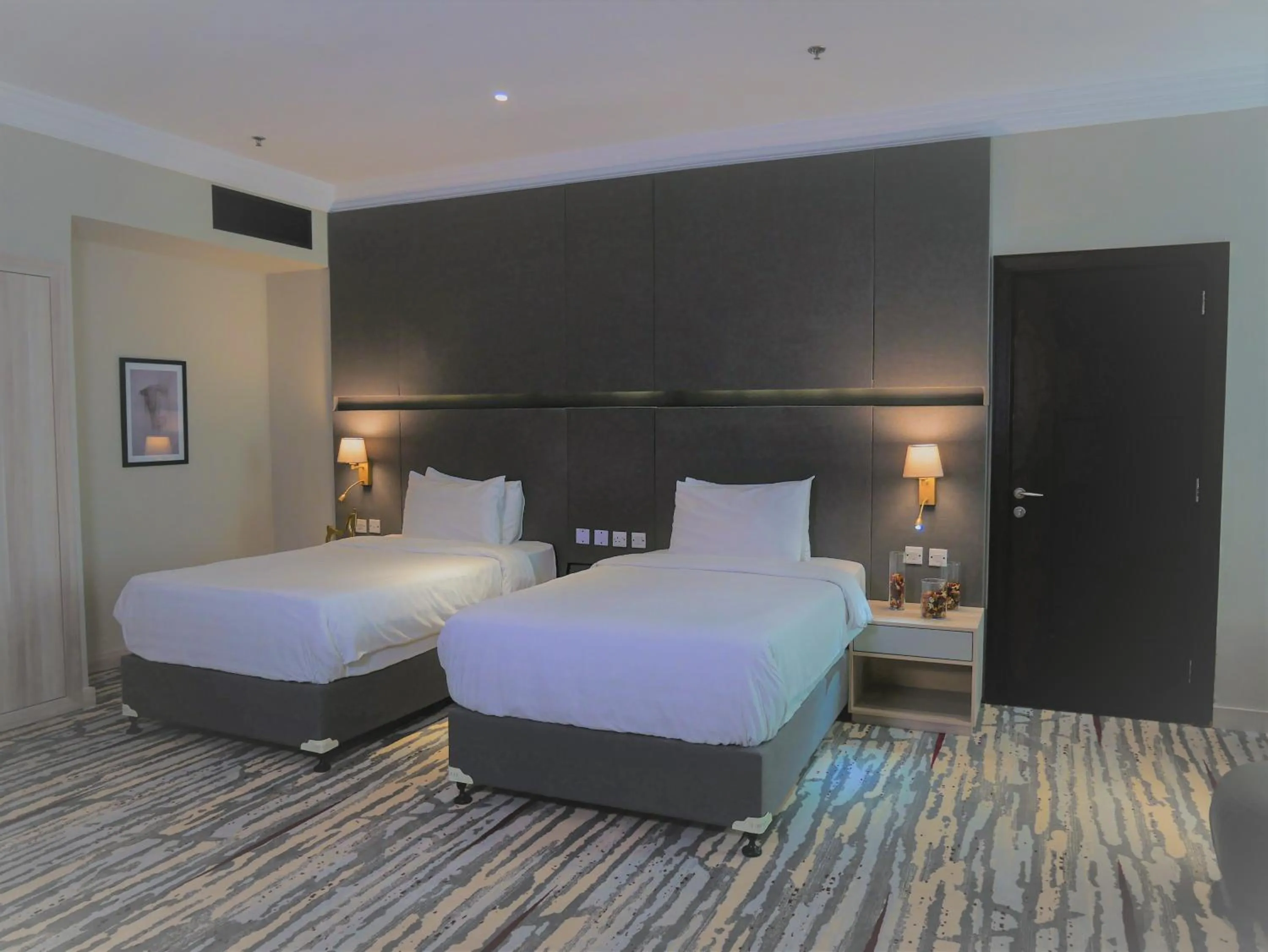 Bed in Ramada by Wyndham Doha Old Town