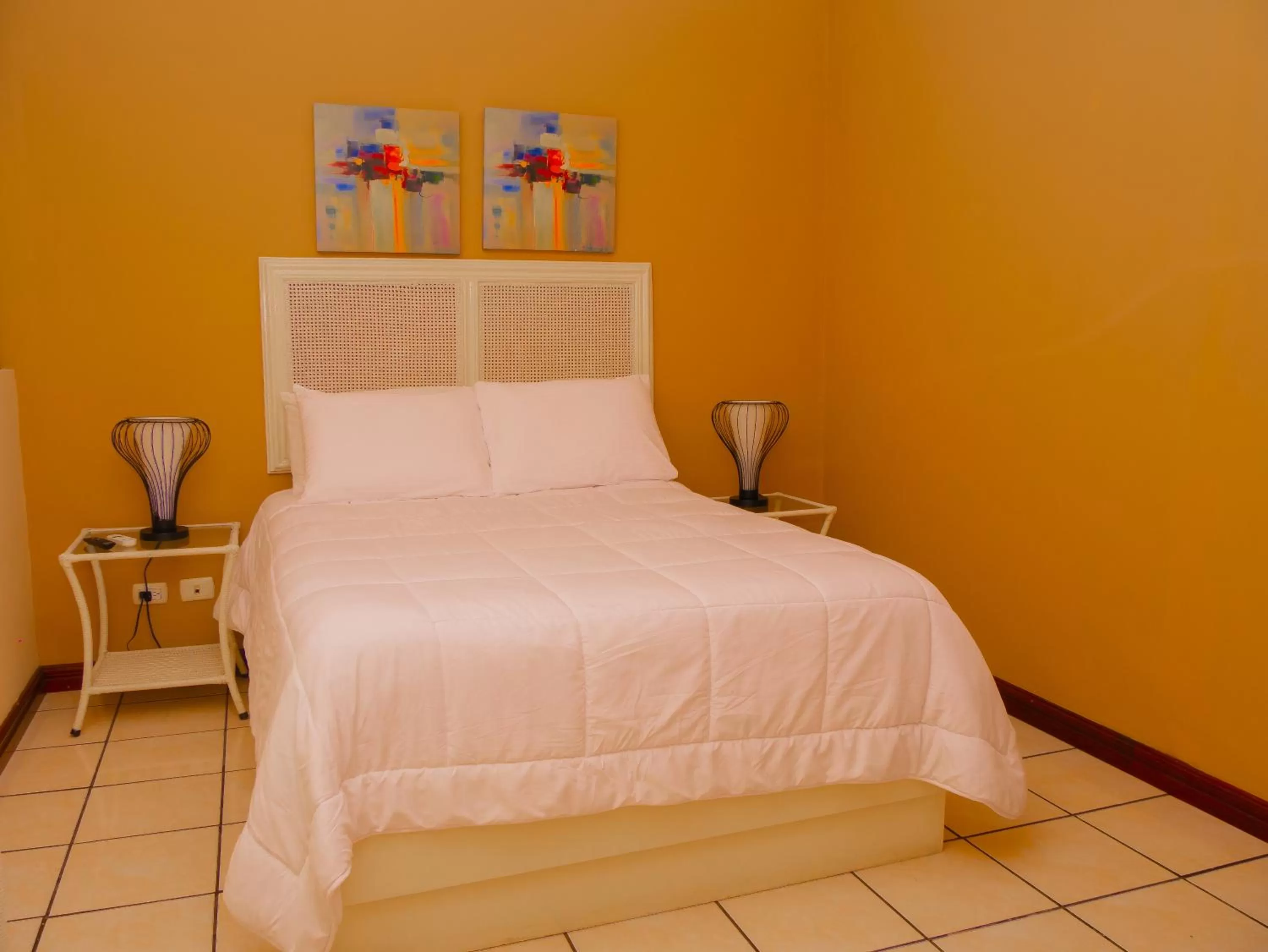 Bed in Hotel Bamboo Aeropuerto