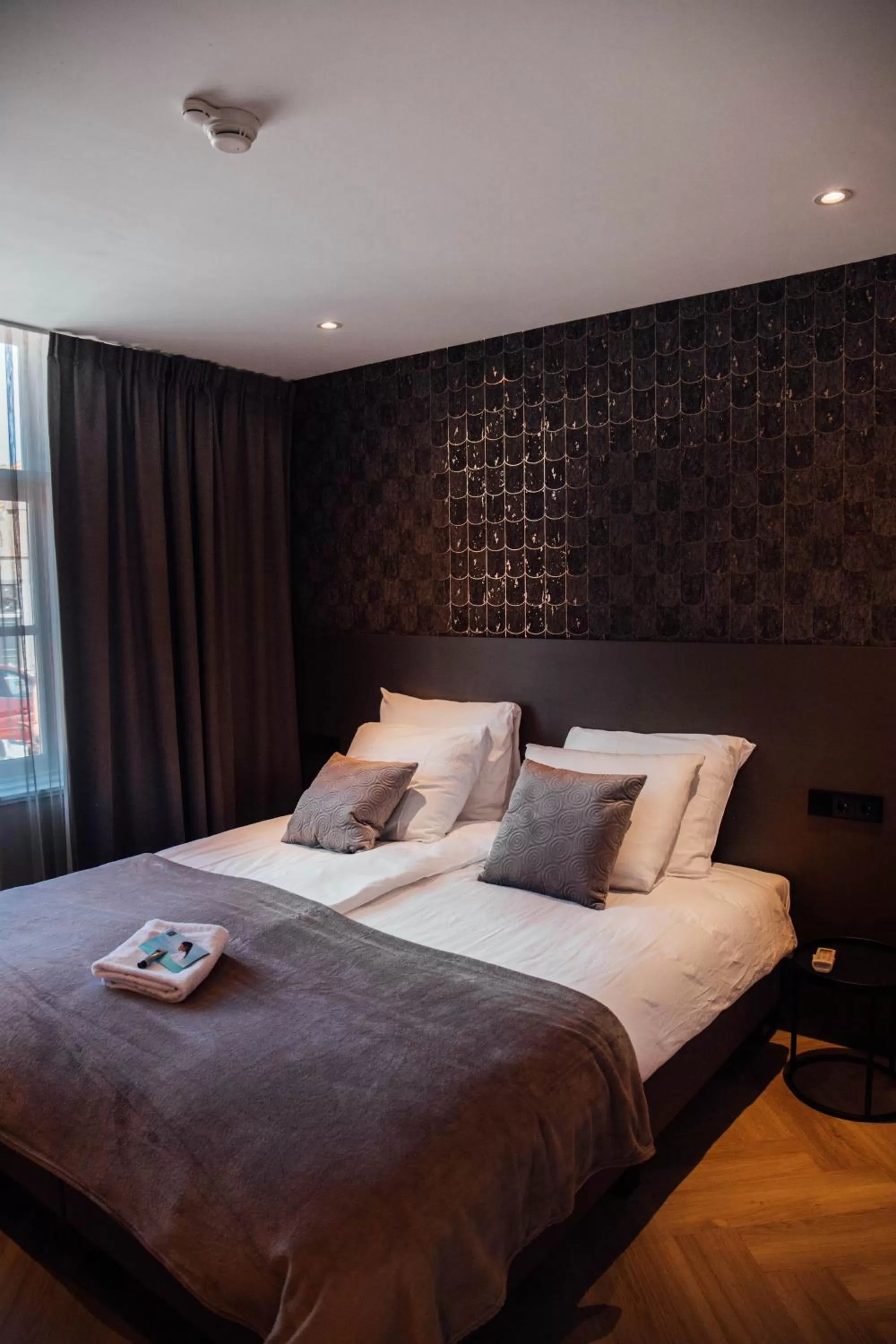 Bed in Harbour Suites Boutique Hotel