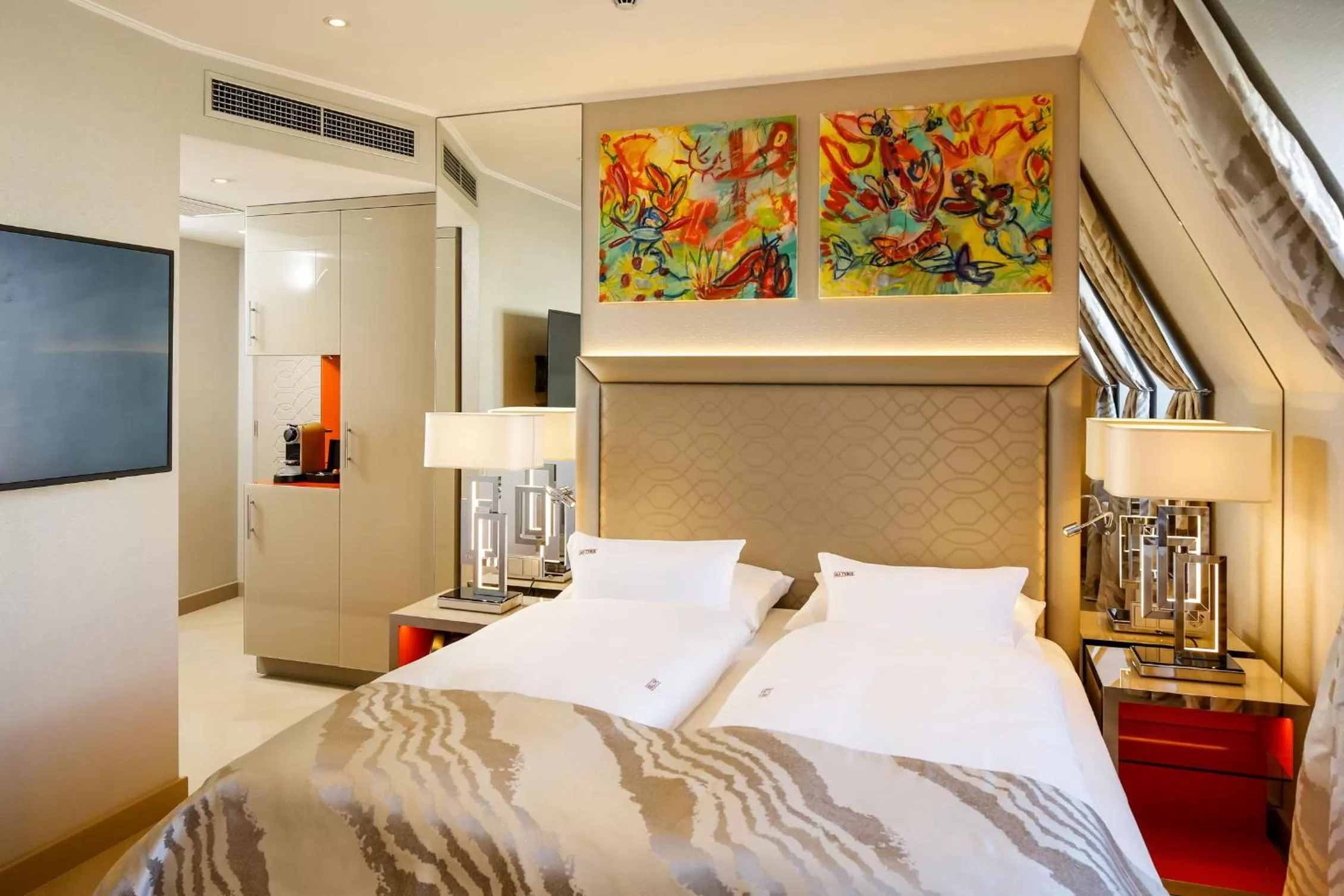 Bed in Boutiquehotel Das Tyrol