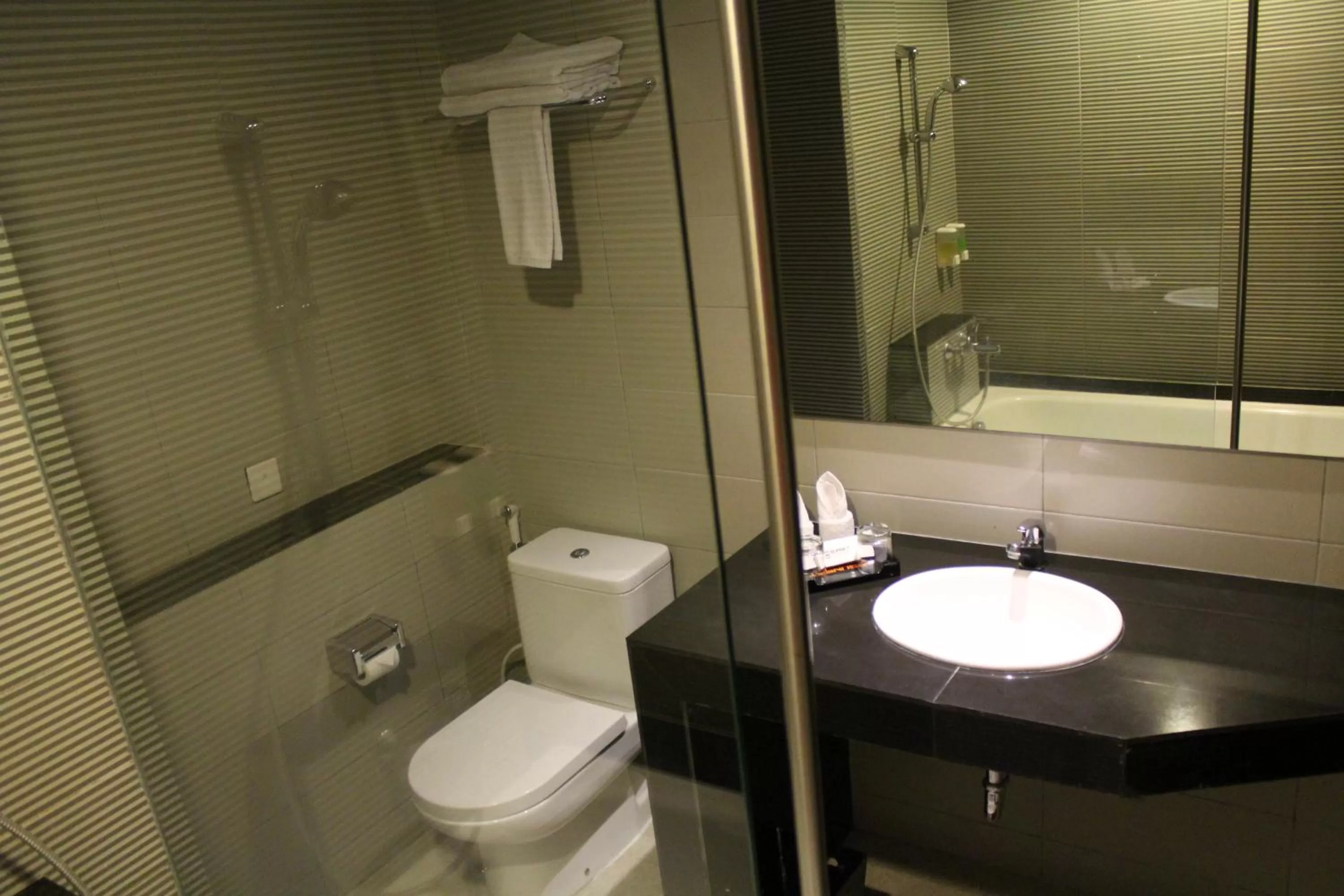 Bathroom in 100 Sunset Kuta Hotel & Ballroom