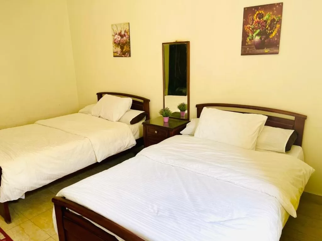 Bed in Charbel apartments