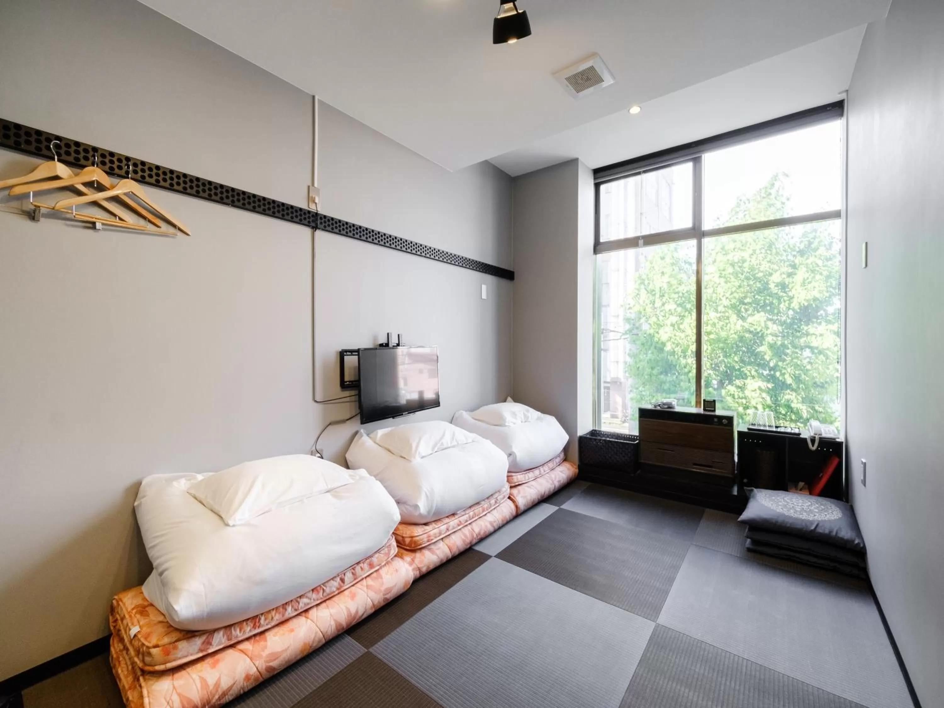 Bed in Tabist THE GREEN ASAHIKAWA