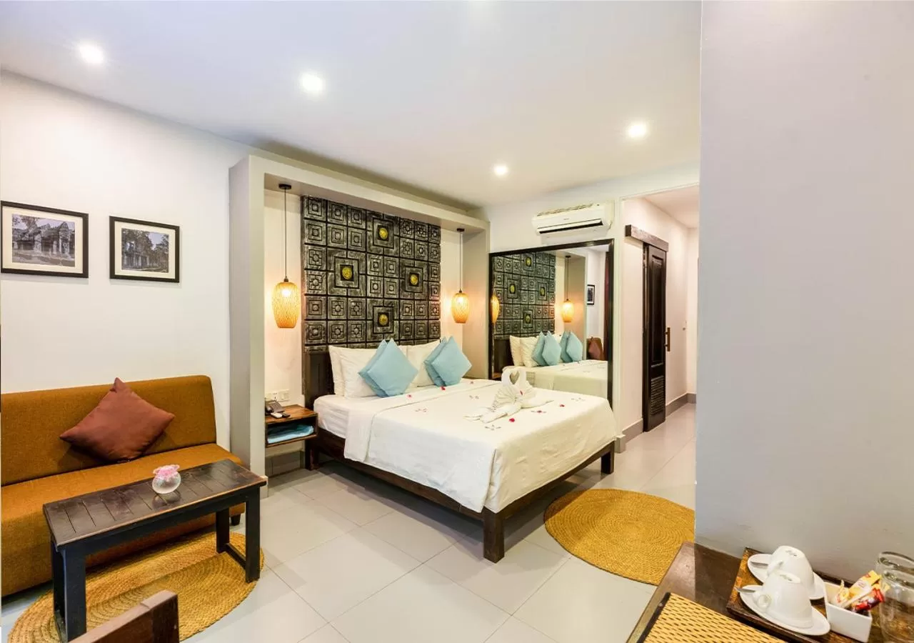 Bed in Ladear Privilege Rooms