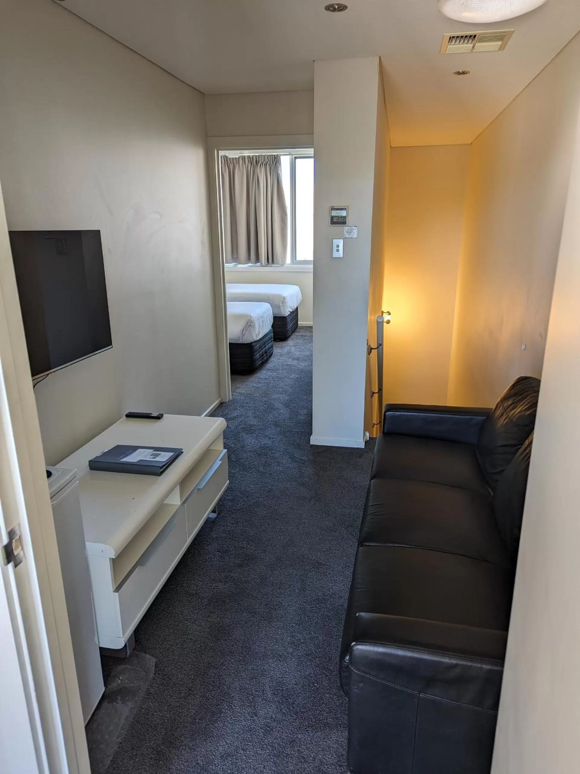 Seating area, Bed in Mawson Lakes Hotel